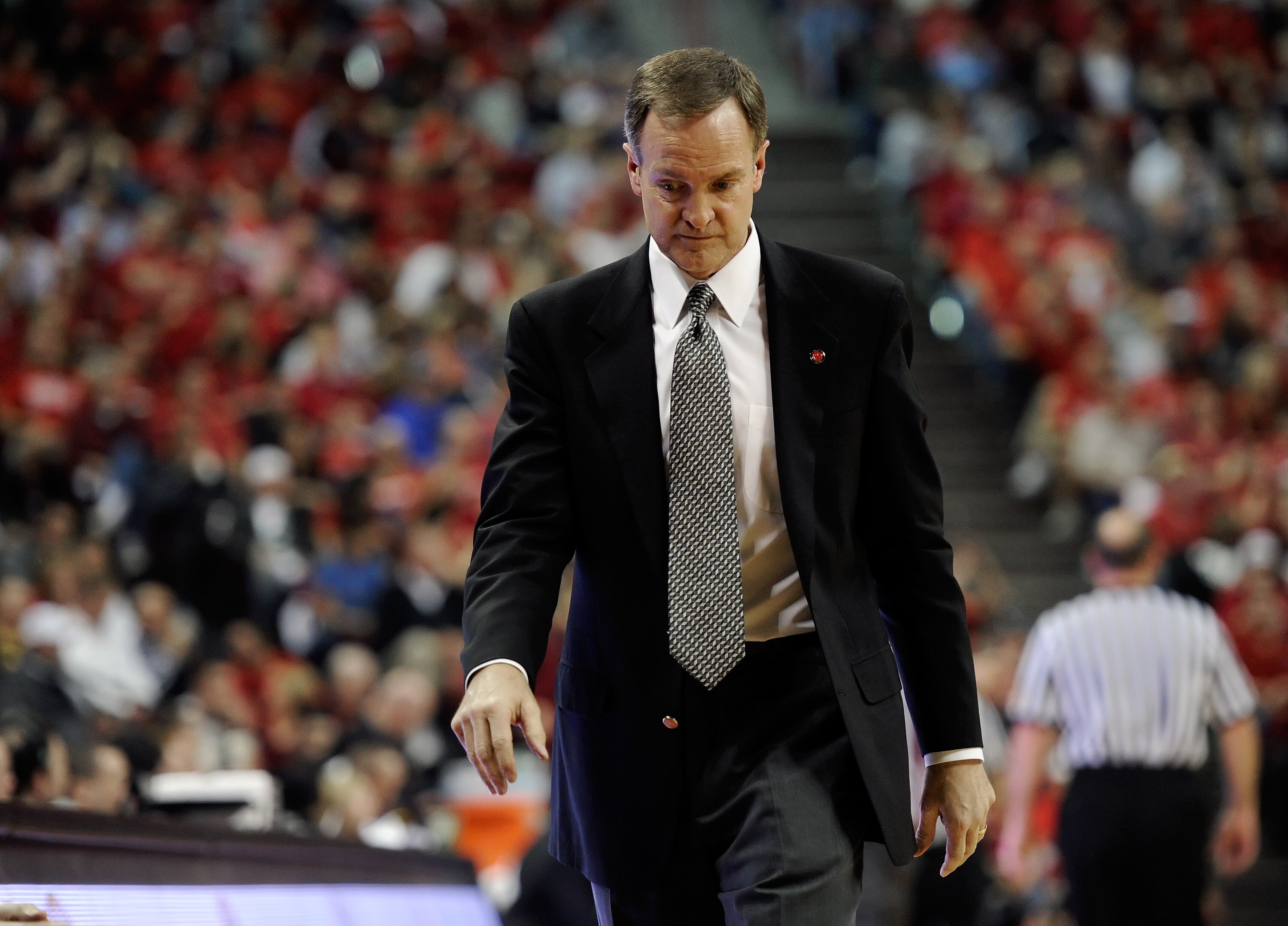 LAS VEGAS, NV - FEBRUARY 12:  Head coach Lon Kruger of the UNLV Rebels looks down during a game against the San Diego State Aztecs at the Thomas & Mack Center February 12, 2011 in Las Vegas, Nevada. San Diego State won 63-57.  (Photo by Ethan Miller/Getty