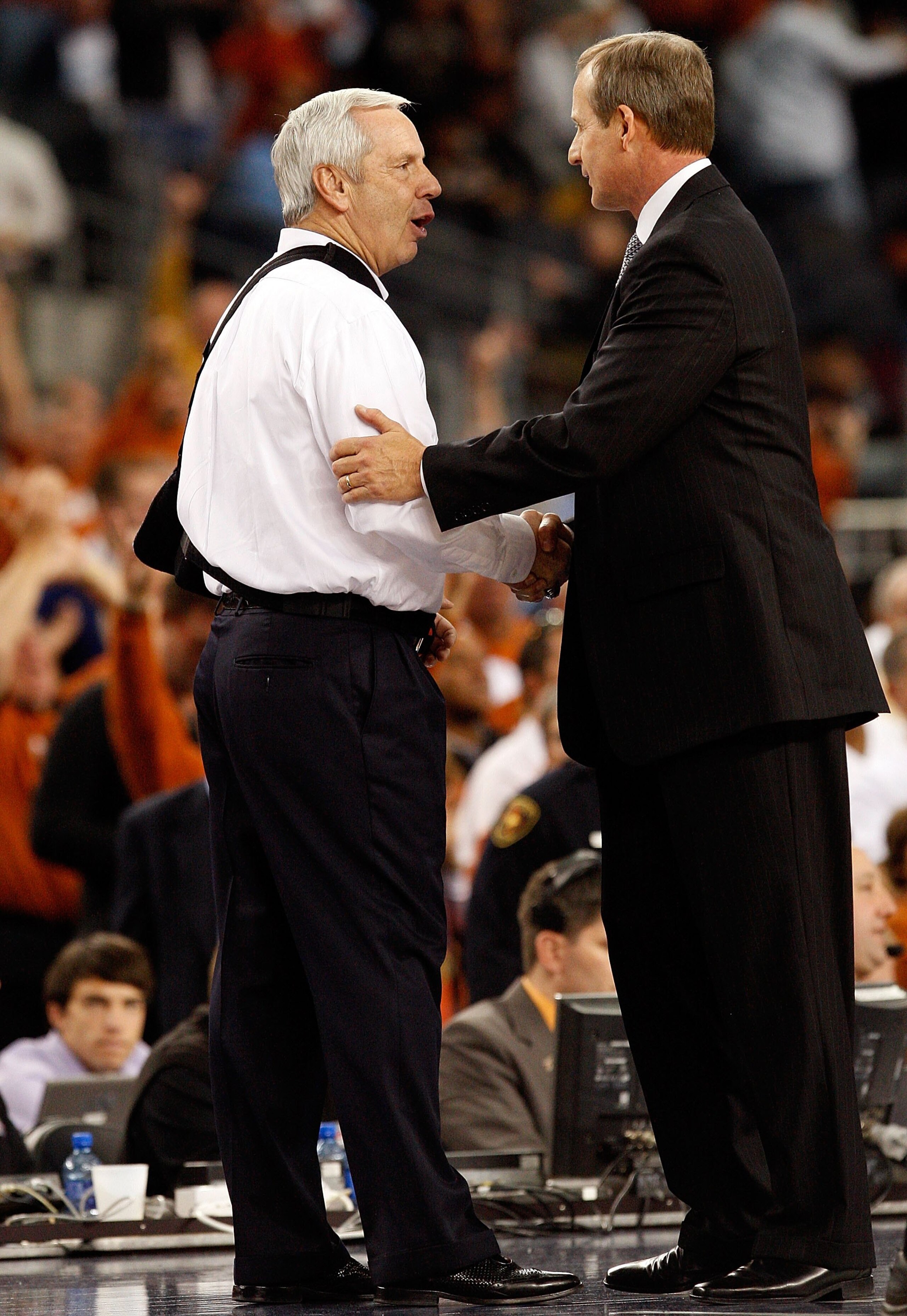 ARLINGTON, TX - DECEMBER 19: Head coach Roy Williams of the North Carolina Tar Heels greets Rick Barnes of the Texas Longhorns at Cowboys Stadium on December 19, 2009 in Arlington, Texas. (Photo by Ronald Martinez/Getty Images) ARLINGTON, TX - DECEMBER 19: Head coach Roy Williams of the North Carolina Tar Heels greets Rick Barnes of the Texas Longhorns at Cowboys Stadium on December 19, 2009 in Arlington, Texas. (Photo by Ronald Martinez/Getty Images)