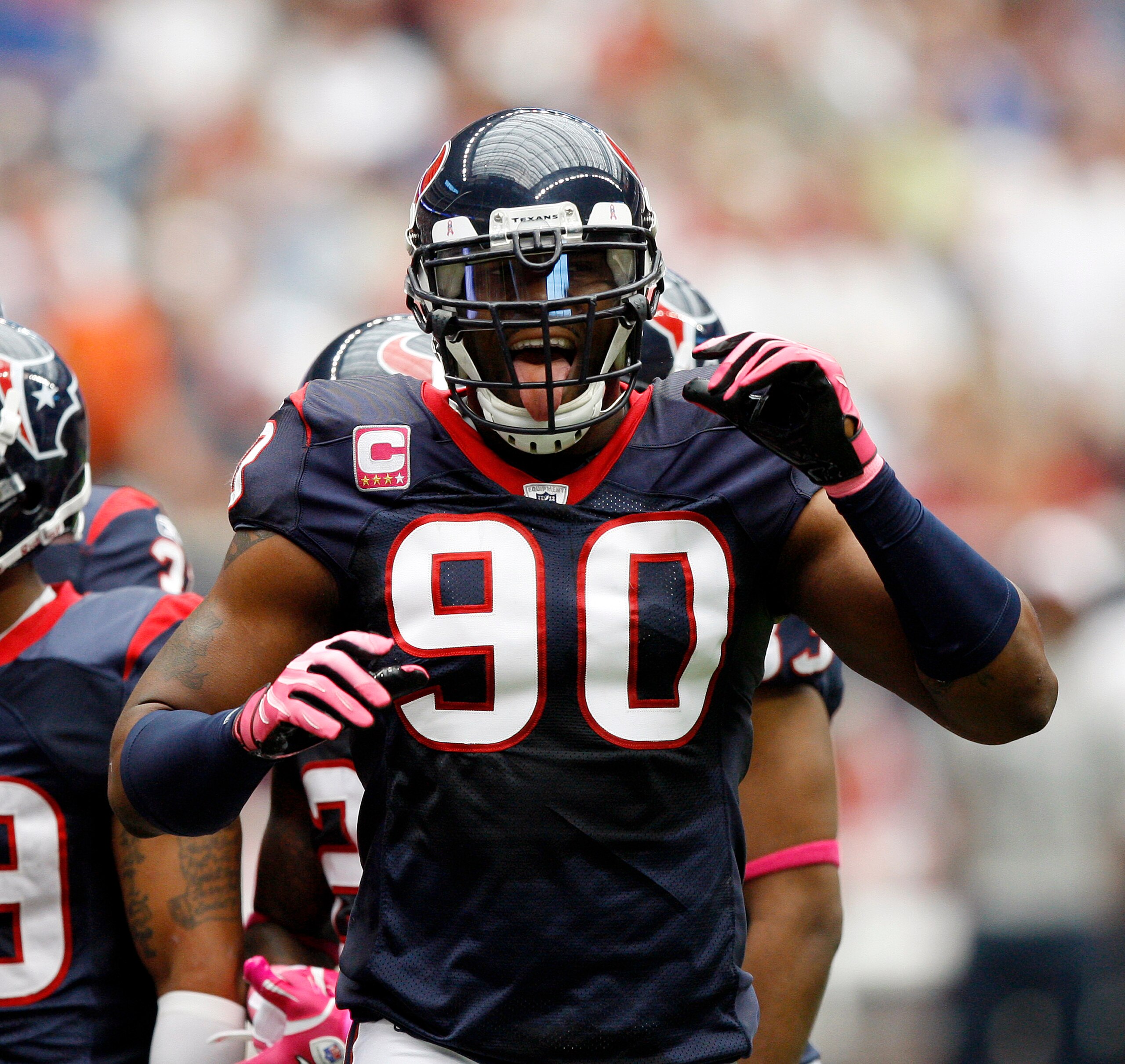 HOUSTON - OCTOBER 10: Defensive end Mario Wiliiams of the Houston Texans tries to get the crowd into the game against the New York Giants at Reliant Stadium on October 10, 2010 in Houston, Texas. (Photo by Bob Levey/Getty Images) HOUSTON - OCTOBER 10: Defensive end Mario Wiliiams of the Houston Texans tries to get the crowd into the game against the New York Giants at Reliant Stadium on October 10, 2010 in Houston, Texas. (Photo by Bob Levey/Getty Images)