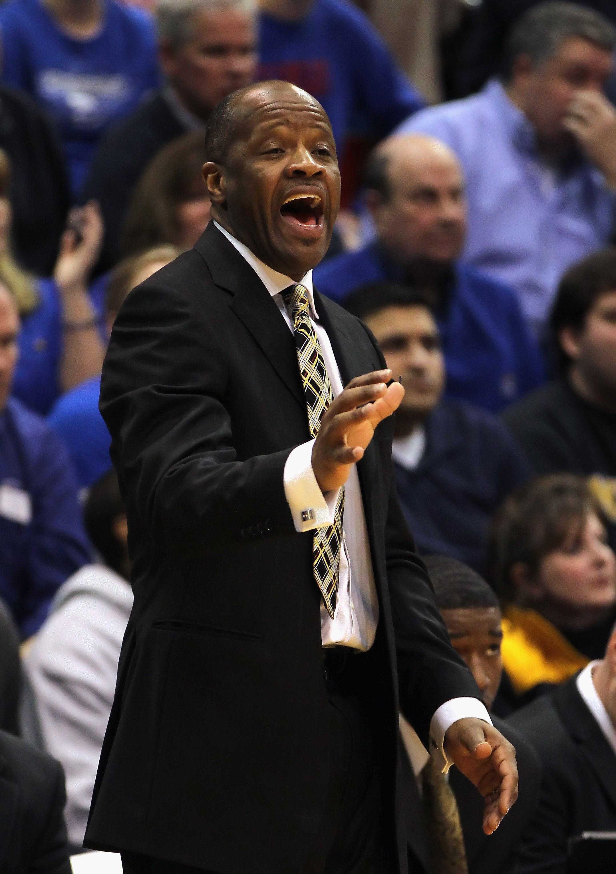 LAWRENCE, KS - FEBRUARY 07:  Head coach Mike Anderson of the Missouri Tigers coaches from the bench during the game against the Kansas Jayhawks on February 7, 2011 at Allen Fieldhouse in Lawrence, Kansas.  (Photo by Jamie Squire/Getty Images)