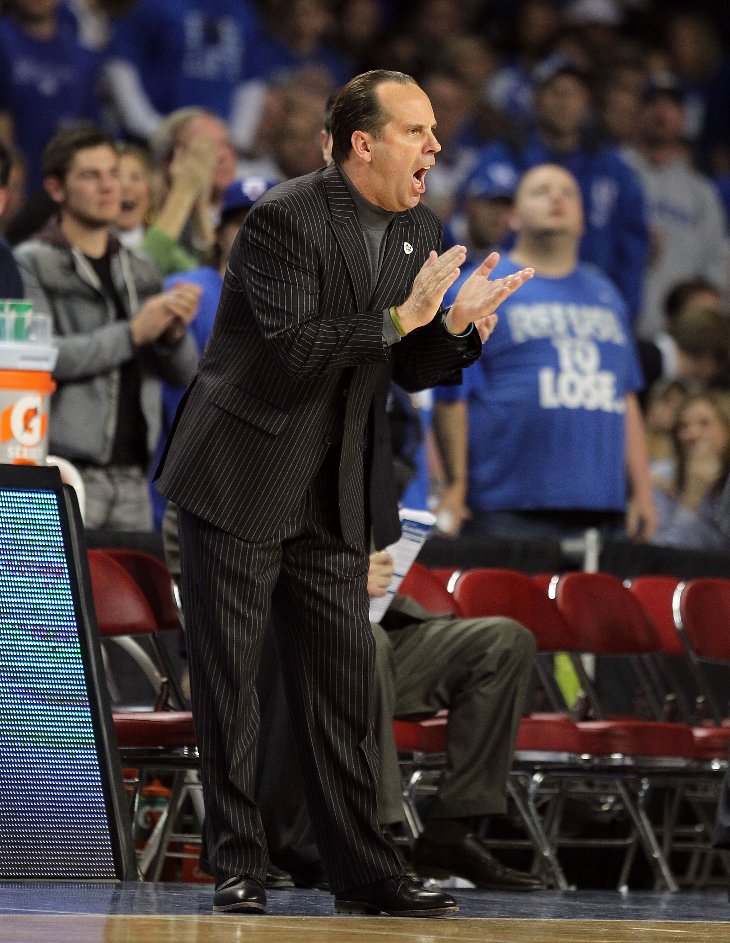 LOUISVILLE, KY - DECEMBER 08: Mike Brey the Head Coach of the Notre Dame Fighting Irish gives instructions to his team during the game against the Kentucky Wildcats in the 2010 DIRECTV SEC/BIG EAST Invitational at Freedom Hall on December 8, 2010 in Loui LOUISVILLE, KY - DECEMBER 08: Mike Brey the Head Coach of the Notre Dame Fighting Irish gives instructions to his team during the game against the Kentucky Wildcats in the 2010 DIRECTV SEC/BIG EAST Invitational at Freedom Hall on December 8, 2010 in Loui