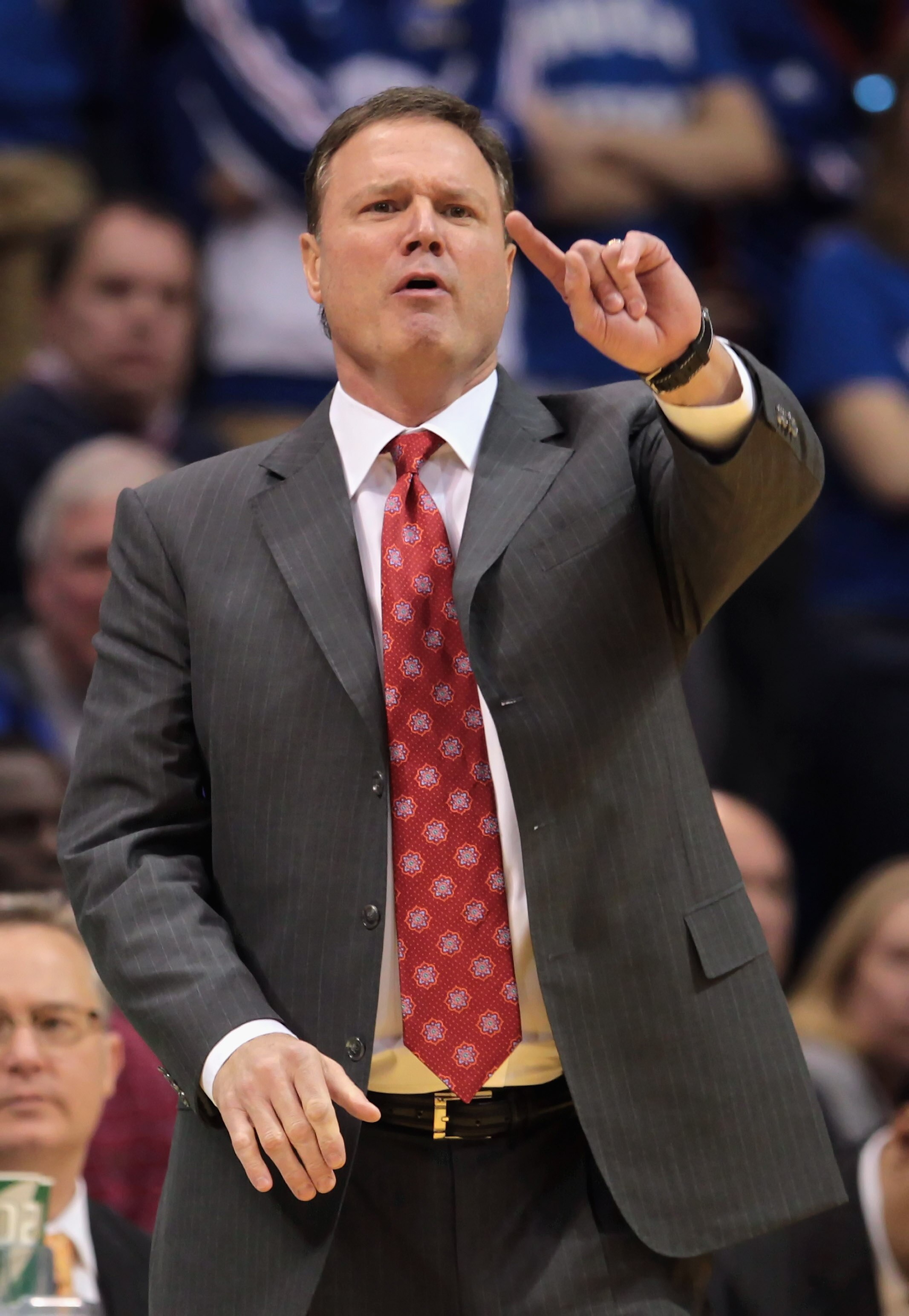 LAWRENCE, KS - FEBRUARY 07:  Head coach Bill Self of the Kansas Jayhawks coaches from the bench during the game against the Missouri Tigers on February 7, 2011 at Allen Fieldhouse in Lawrence, Kansas.  (Photo by Jamie Squire/Getty Images)