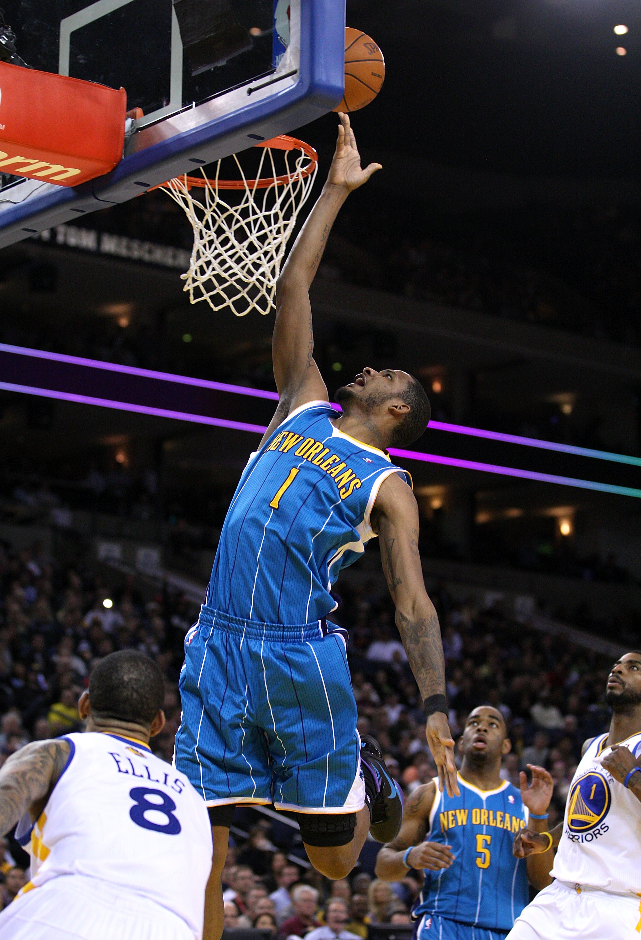 OAKLAND, CA - JANUARY 26:  Trevor Ariza #1 of the New Orleans Hornets goes up for a shot during their game against the Golden State Warriors at Oracle Arena on January 26, 2011 in Oakland, California.  NOTE TO USER: User expressly acknowledges and agrees 