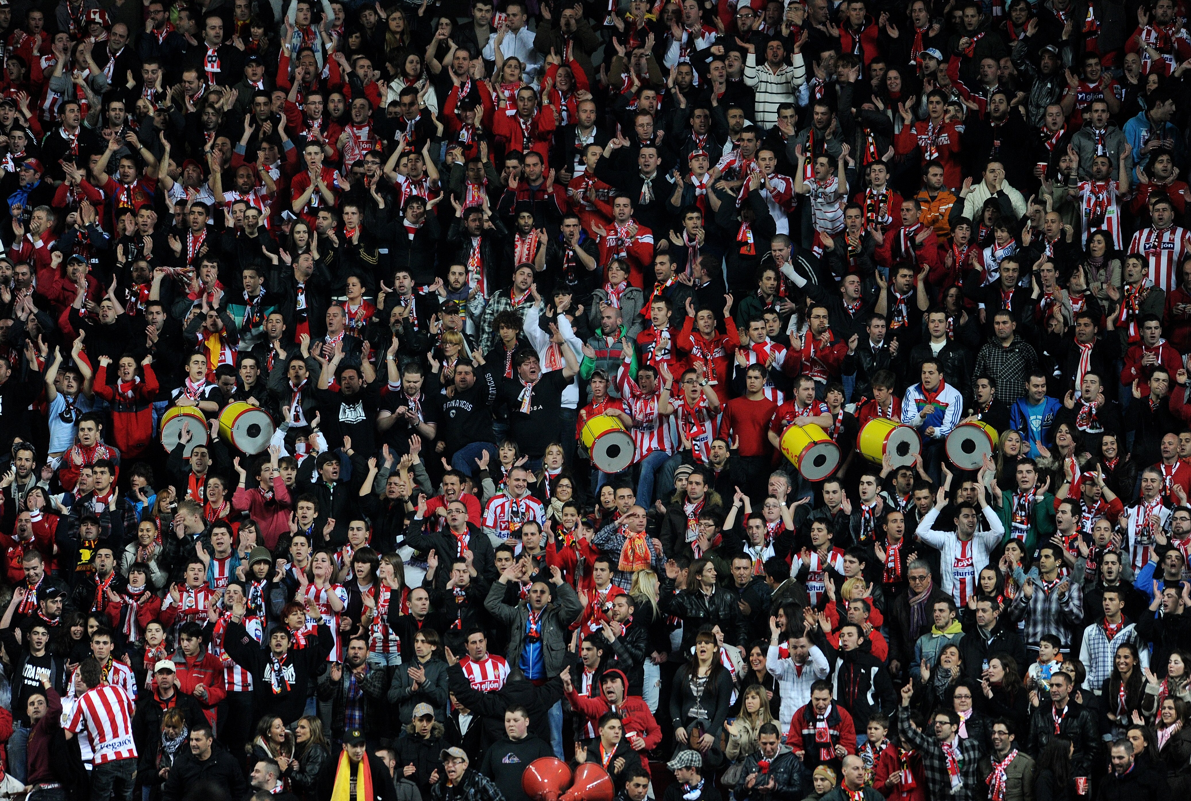 GIJON, SPAIN - FEBRUARY 12:  Sporting Gijon fans cheer during the la Liga match between Sporting Gijon and Barcelona at El Molinon Stadium on February 12, 2011 in Gijon, Spain.  (Photo by Jasper Juinen/Getty Images)