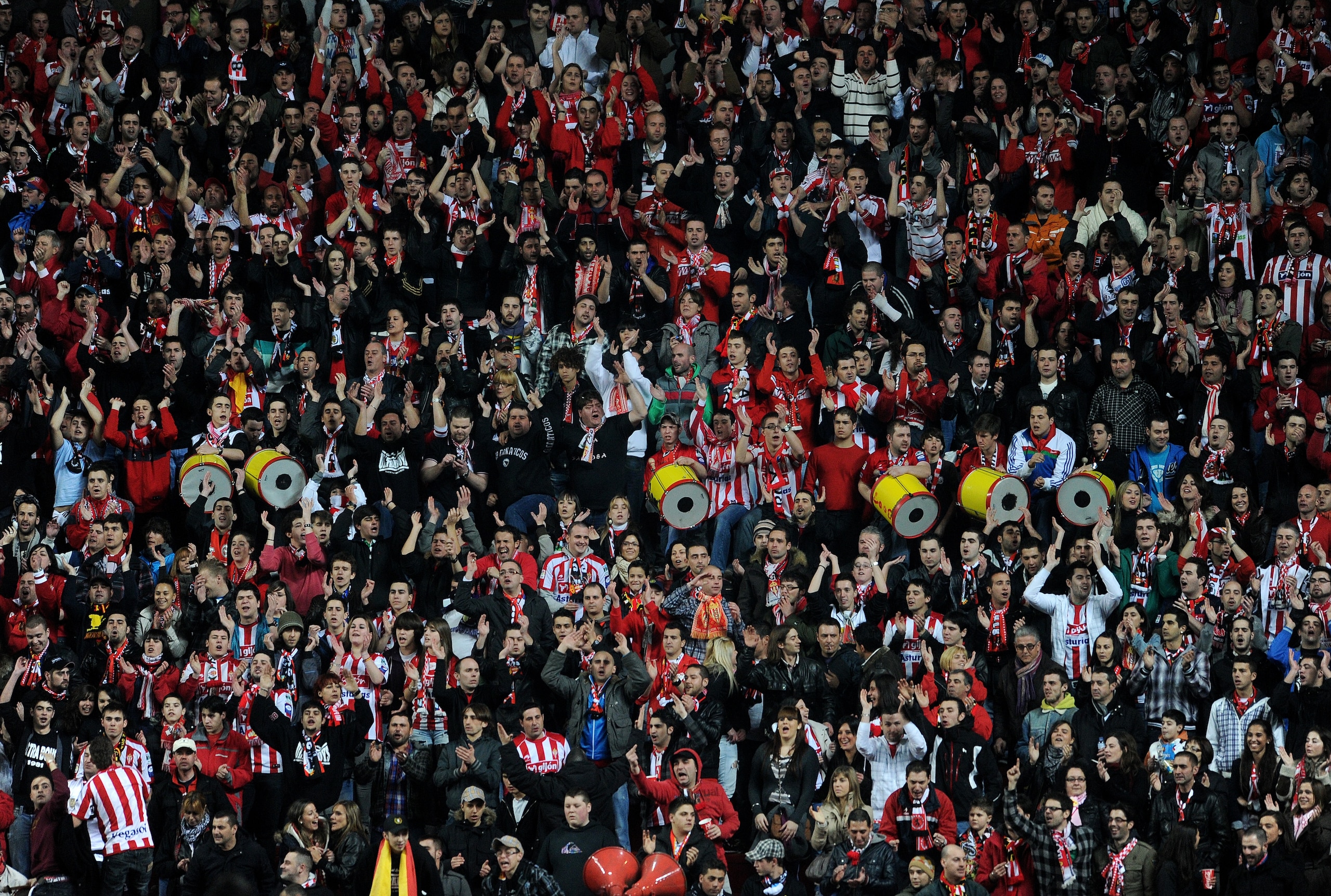 GIJON, SPAIN - FEBRUARY 12:  Sporting Gijon fans cheer during the la Liga match between Sporting Gijon and Barcelona at El Molinon Stadium on February 12, 2011 in Gijon, Spain.  (Photo by Jasper Juinen/Getty Images)