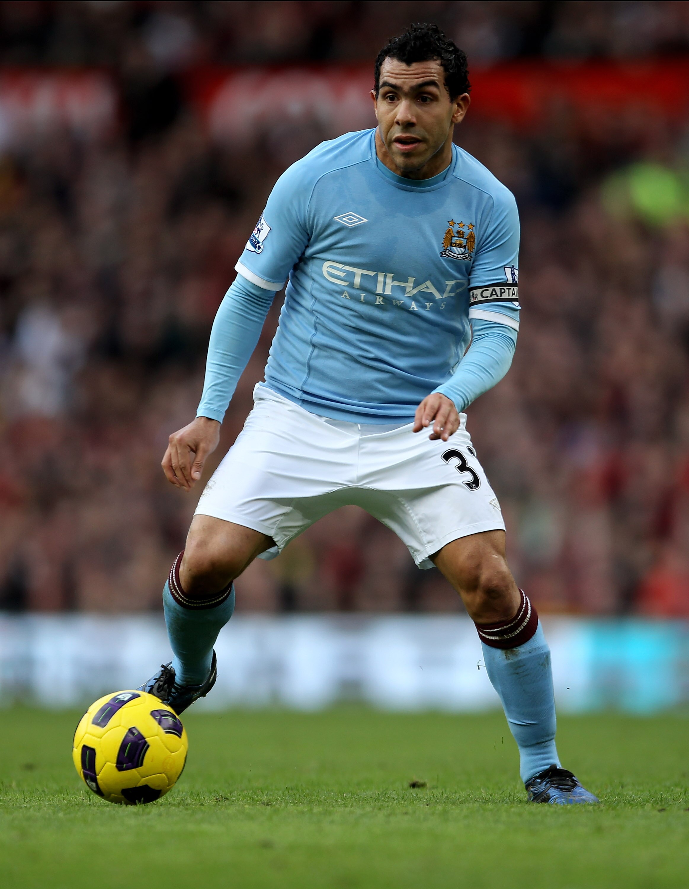 MANCHESTER, ENGLAND - FEBRUARY 12:  Carlos Tevez of Manchester City in action during the Barclays Premier League match between Manchester United and Manchester City at Old Trafford on February 12, 2011 in Manchester, England.  (Photo by Alex Livesey/Getty