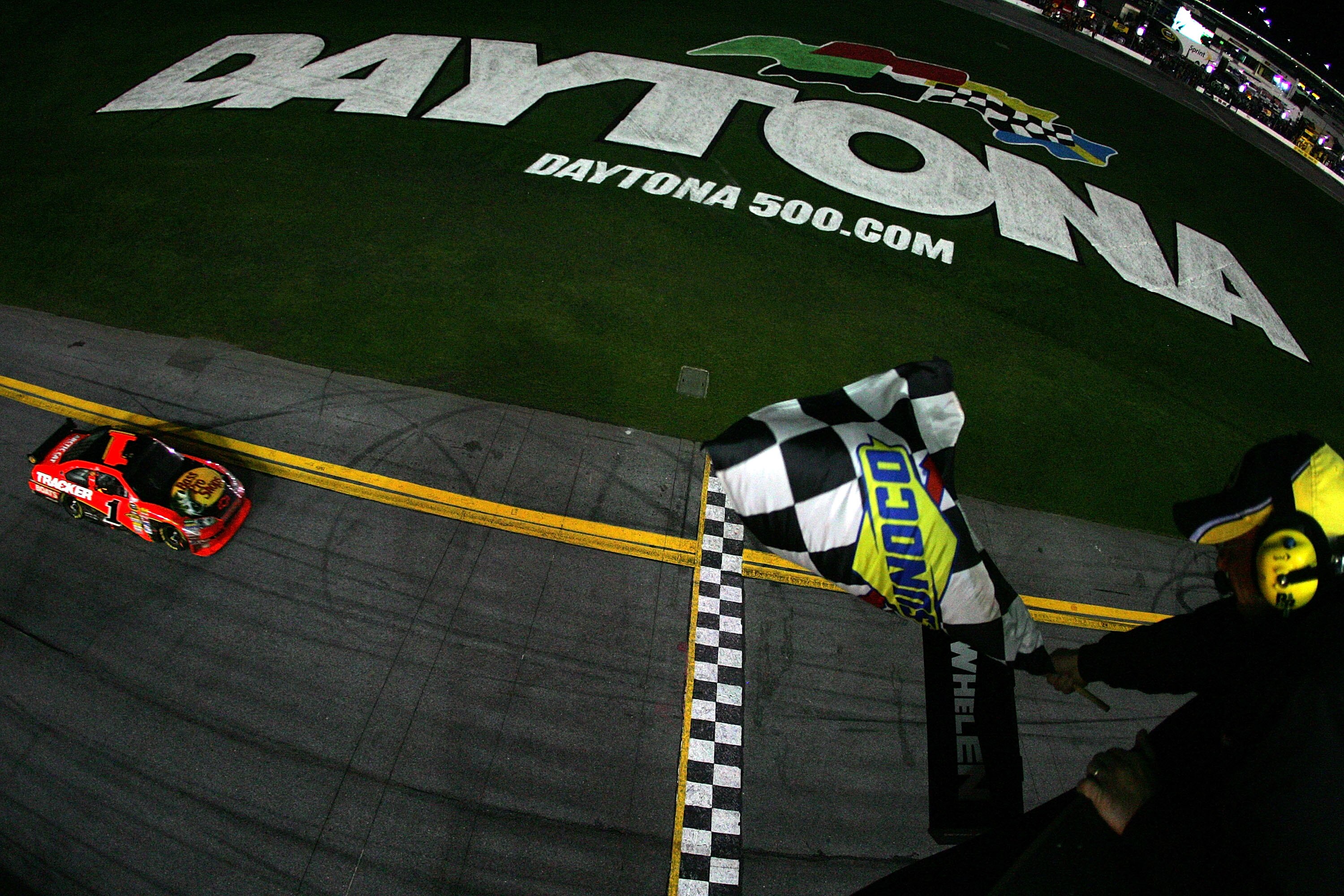 DAYTONA BEACH, FL - FEBRUARY 14:  Jamie McMurray, driver of the #1 Bass Pro Shops/Tracker Boats Chevrolet, approaches the finish line to win the NASCAR Sprint Cup Series Daytona 500 at Daytona International Speedway on February 14, 2010 in Daytona Beach,