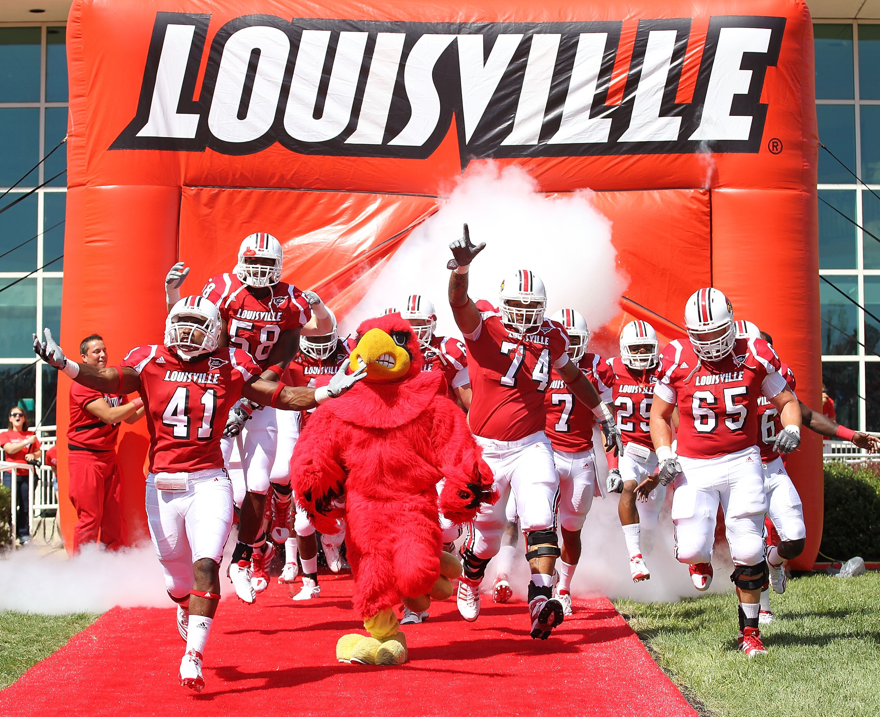 LOUISVILLE, KY - SEPTEMBER 04:  The Louisville Cardinals take to field before the game against the  Kentucky Wildcats at Papa John's Cardinal Stadium on September 4, 2010 in Louisville, Kentucky.  (Photo by Andy Lyons/Getty Images)