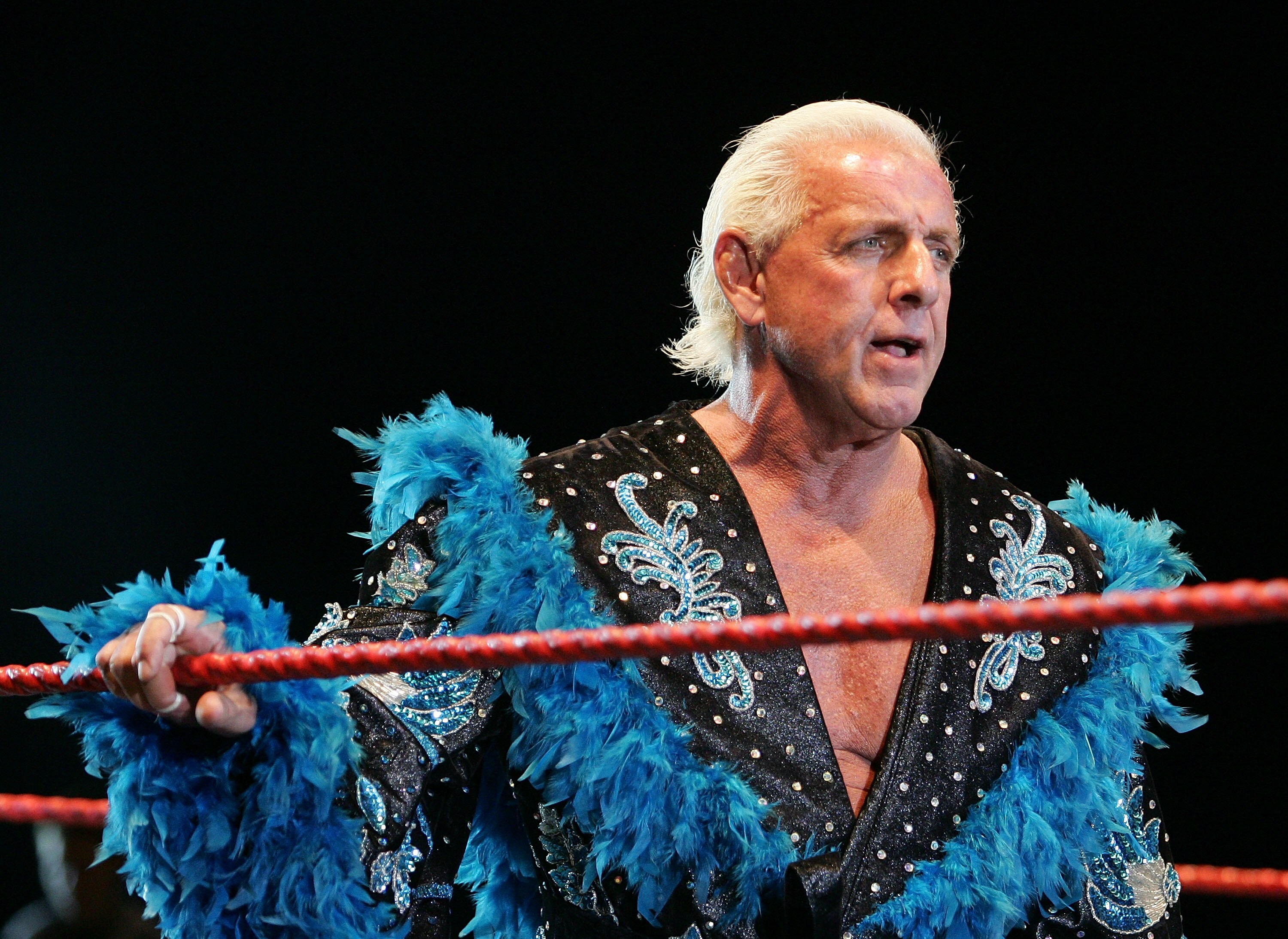 PERTH, AUSTRALIA - NOVEMBER 24:  Rick Flair looks on while awaiting the entrance of Hulk Hogan during the Hulkamania Tour at the Burswood Dome on November 24, 2009 in Perth, Australia.  (Photo by Paul Kane/Getty Images)