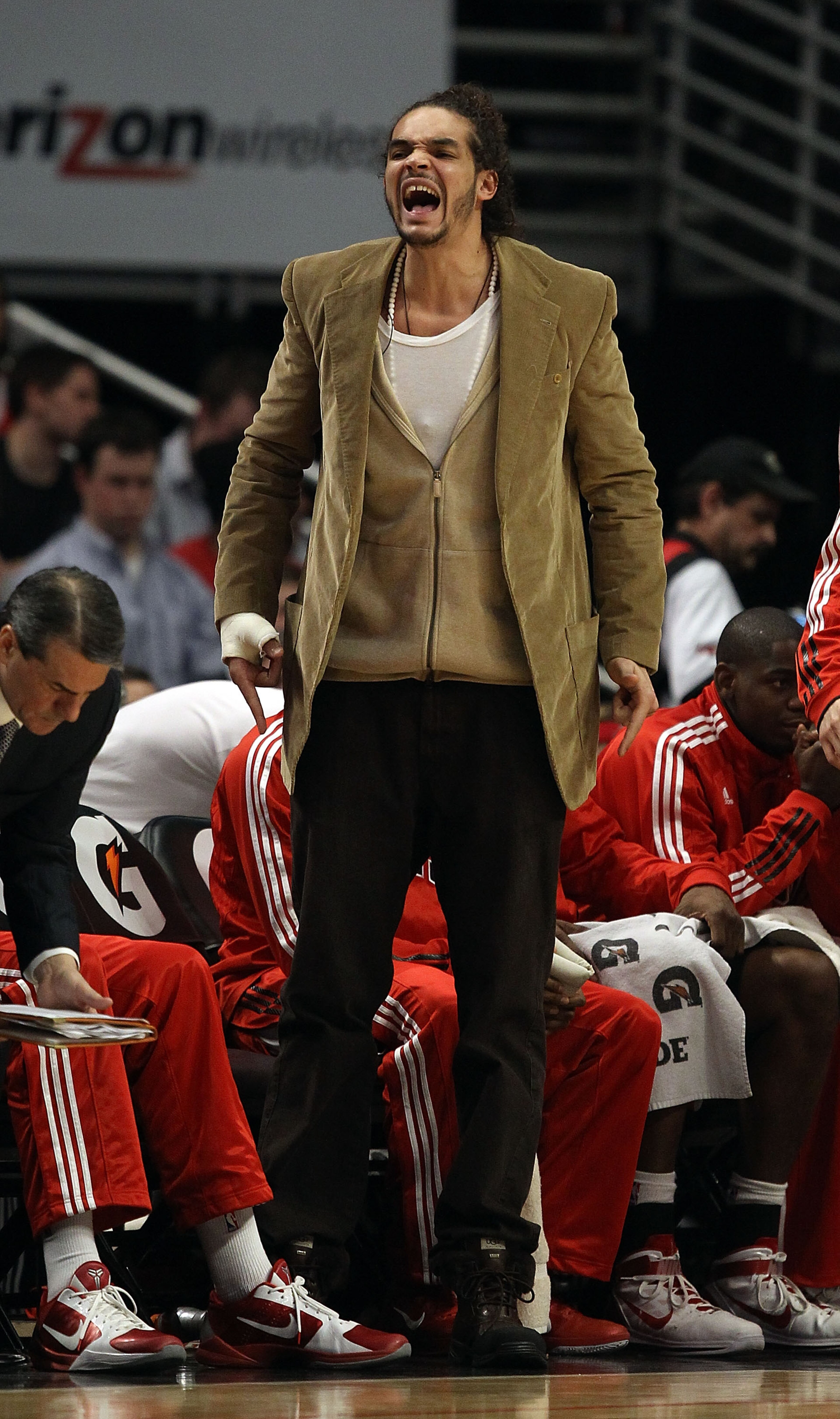 CHICAGO, IL - JANUARY 28: Injured player Joakim Noah of the Chicago Bulls shouts encouragement to teammates from the bench during a game against the Orlando Magic at the United Center on January 28, 2011 in Chicago, Illinois. The Bulls defeated the Magic CHICAGO, IL - JANUARY 28: Injured player Joakim Noah of the Chicago Bulls shouts encouragement to teammates from the bench during a game against the Orlando Magic at the United Center on January 28, 2011 in Chicago, Illinois. The Bulls defeated the Magic