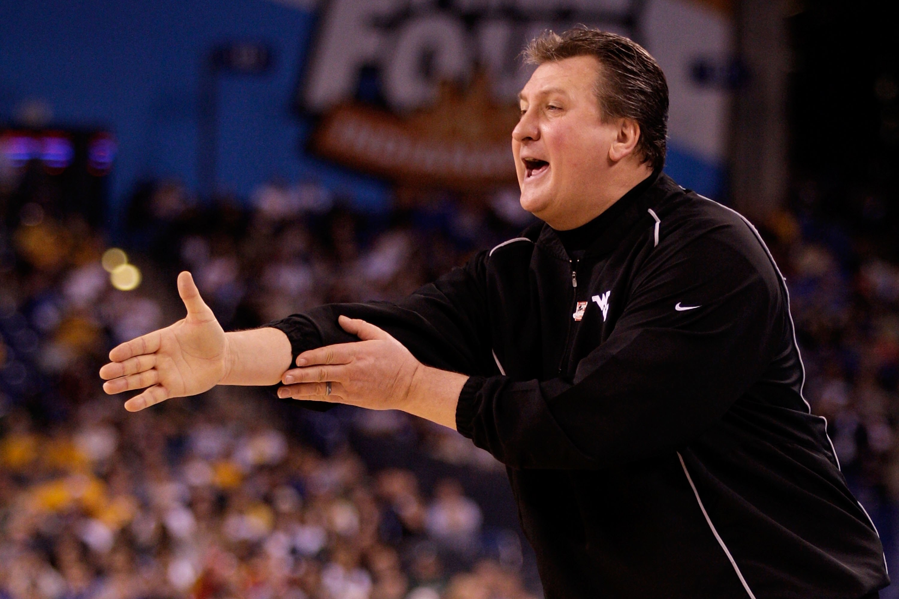 INDIANAPOLIS - APRIL 03:  Head coach Bob Huggins of the West Virginia Mountaineers reacts while taking on the Duke Blue Devils during the National Semifinal game of the 2010 NCAA Division I Men's Basketball Championship at Lucas Oil Stadium on April 3, 20