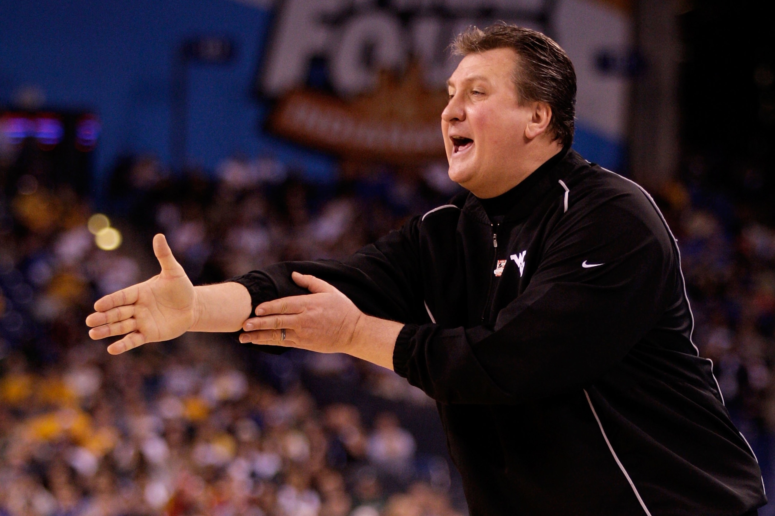 INDIANAPOLIS - APRIL 03:  Head coach Bob Huggins of the West Virginia Mountaineers reacts while taking on the Duke Blue Devils during the National Semifinal game of the 2010 NCAA Division I Men's Basketball Championship at Lucas Oil Stadium on April 3, 20