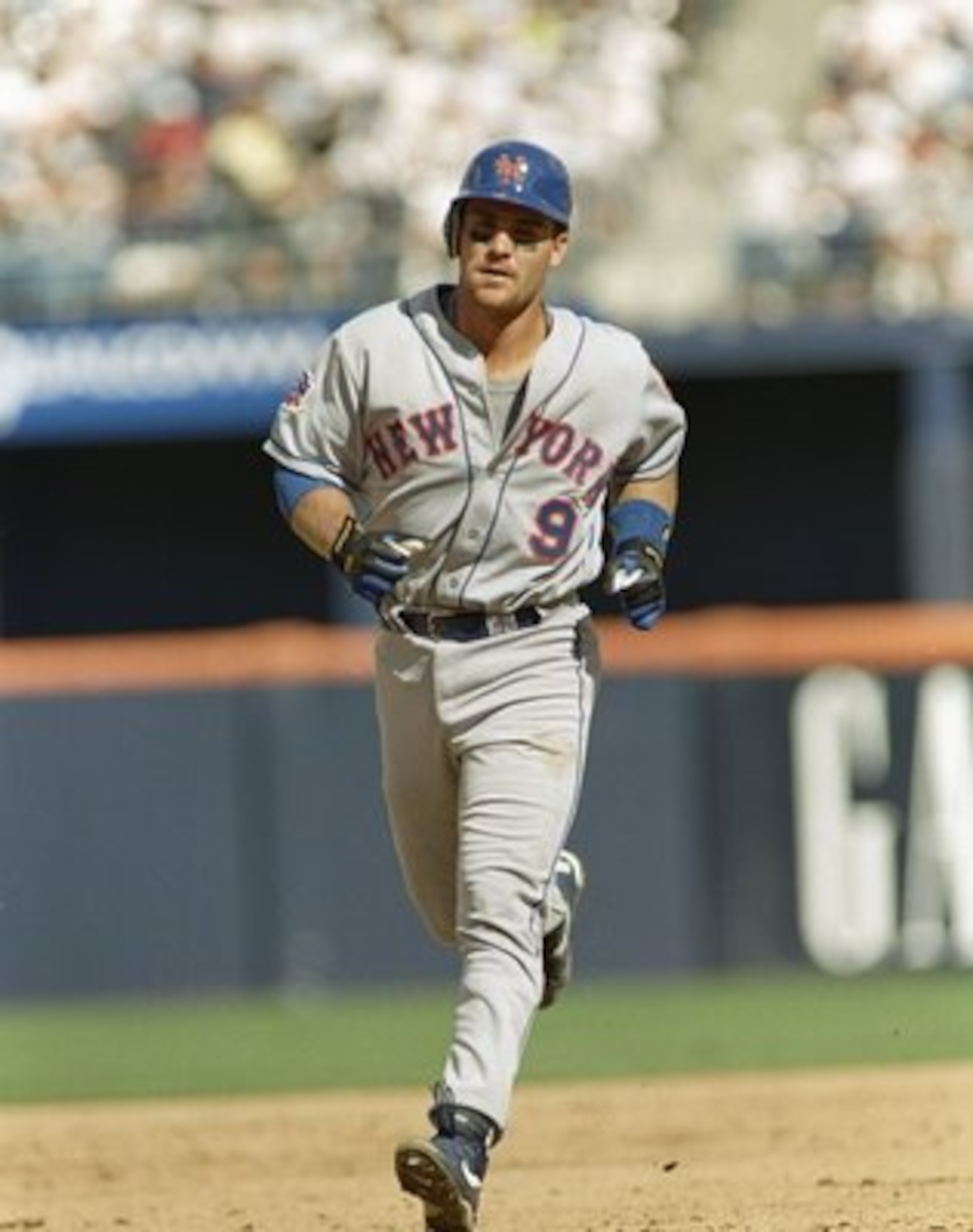 Right fielder Todd Hundley of the New York Mets runs to a base during a game against the San Diego Padres at Jack Murphy Stadium in San Diego, California. The Padres won the game 12-5.