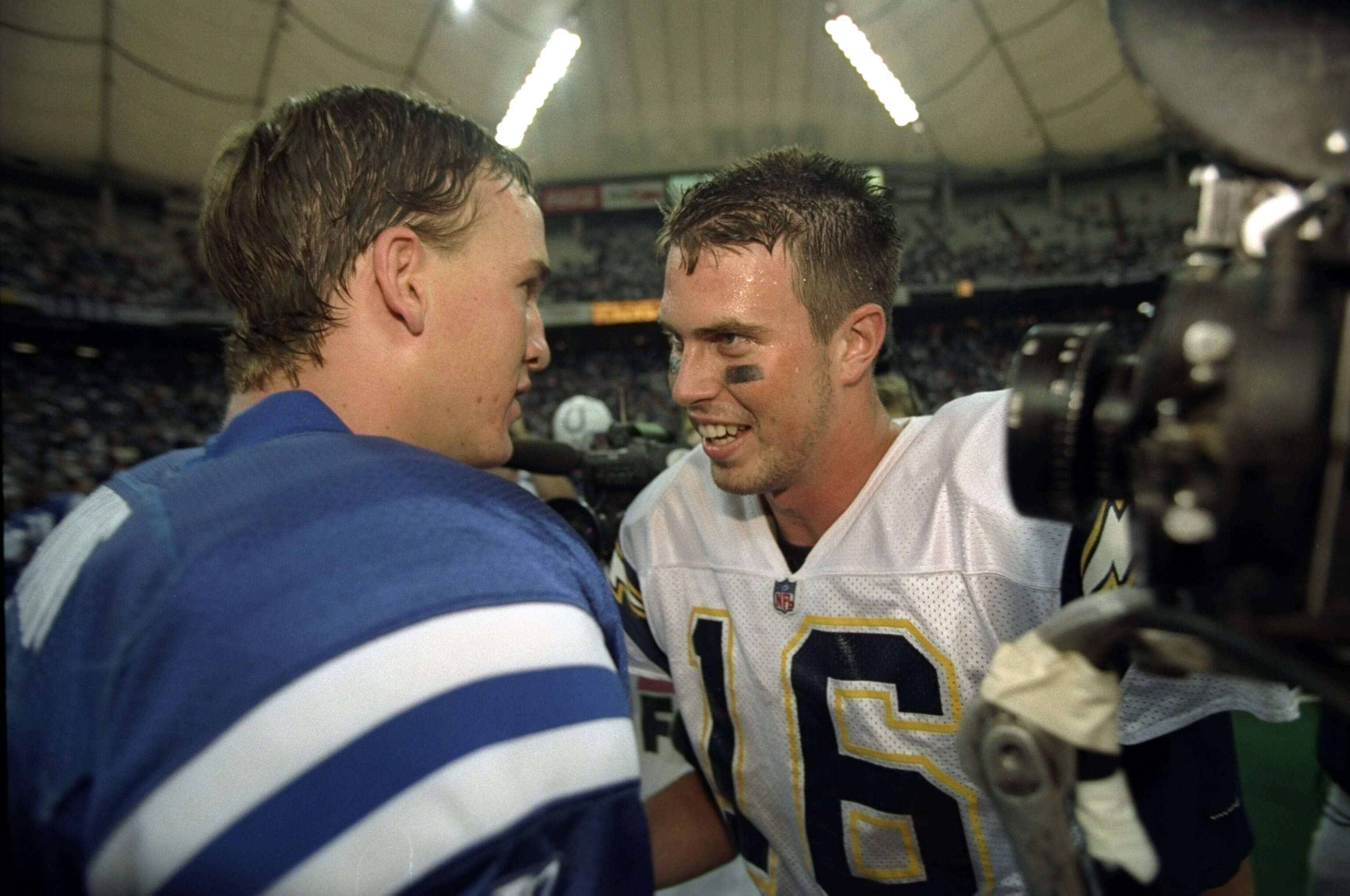 4 Oct 1998:  Quarterback Ryan Leaf #16 of the San Diego Chargers greets quarterback Peyton Manning #18 of the Indianapolis Colts following a game at the RCA Dome in Indianapolis, Indiana. The Colts defeated the Chargers 17-12. Mandatory Credit: Vincent La