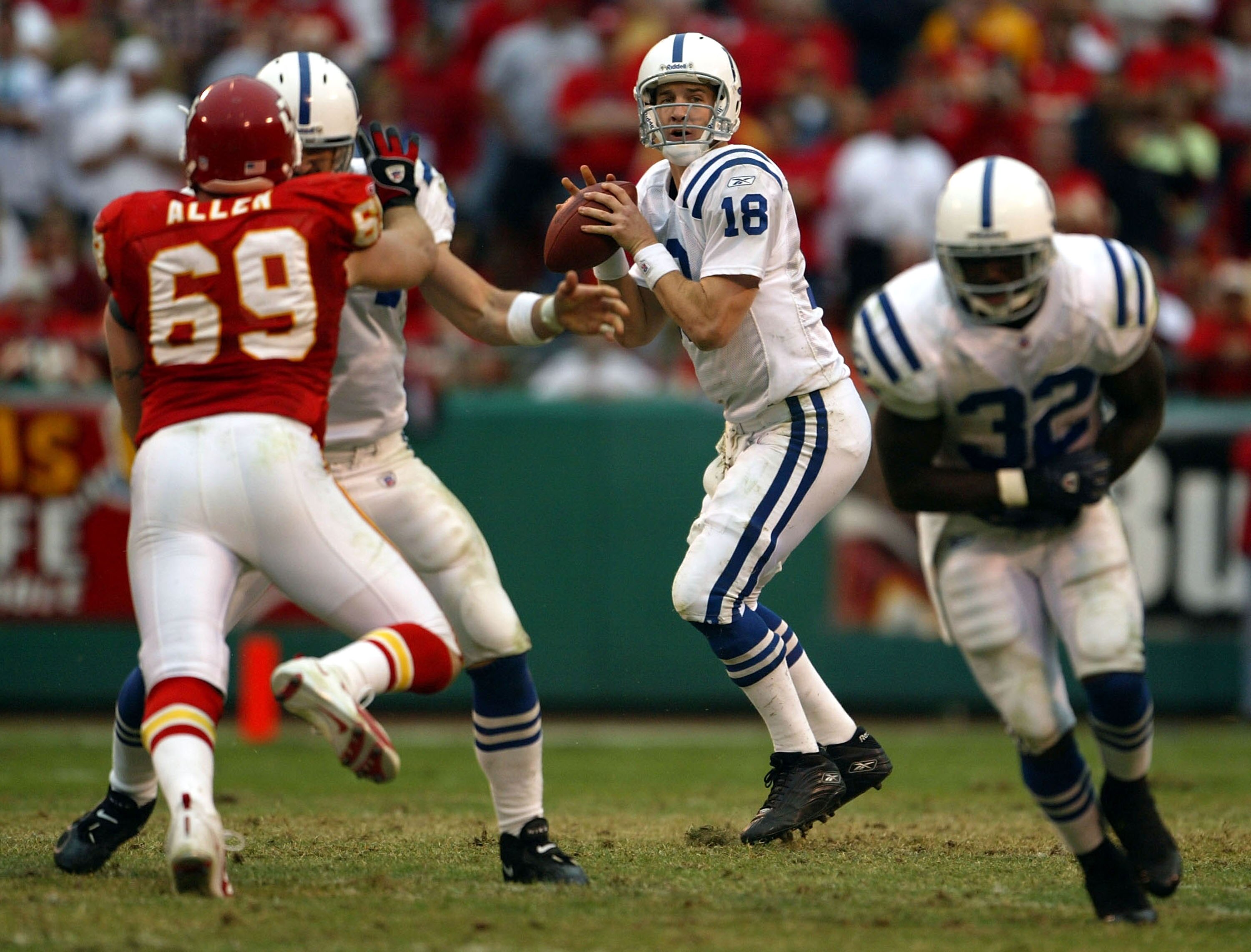 KANSAS CITY, MO - OCTOBER 31:  Quarterback Peyton Manning #18 of the Indianapolis Colts drops back to pass against the Kansas City Chiefs on October 31, 2004 at Arrowhead Stadium in Kansas City, Missouri. The Chiefs defeated the Colts 45-35.  (Photo by Je