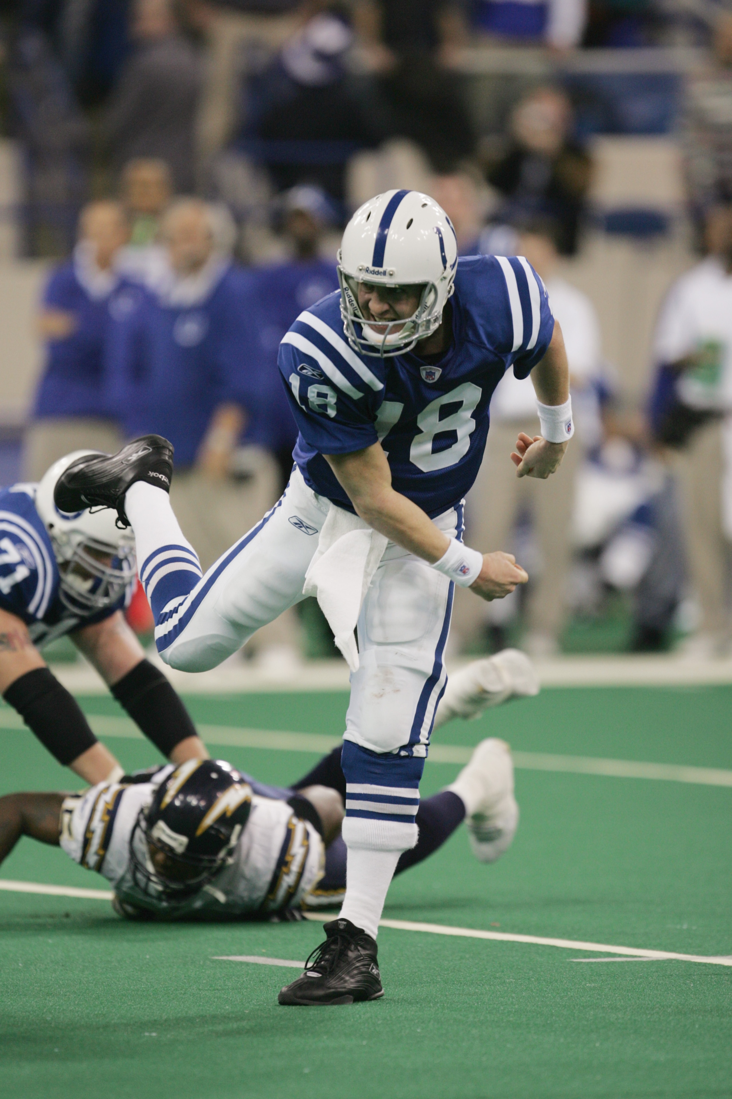 INDIANAPOLIS - DECEMBER 26:  Peyton Manning #18 of the Indianapolis Colts follows through on a pass against the San Diego Chargers on December 26, 2004 at the RCA Dome in Indianapolis, Indiana.  Peyton Manning passed Dan Marino as he threw his NFL regular