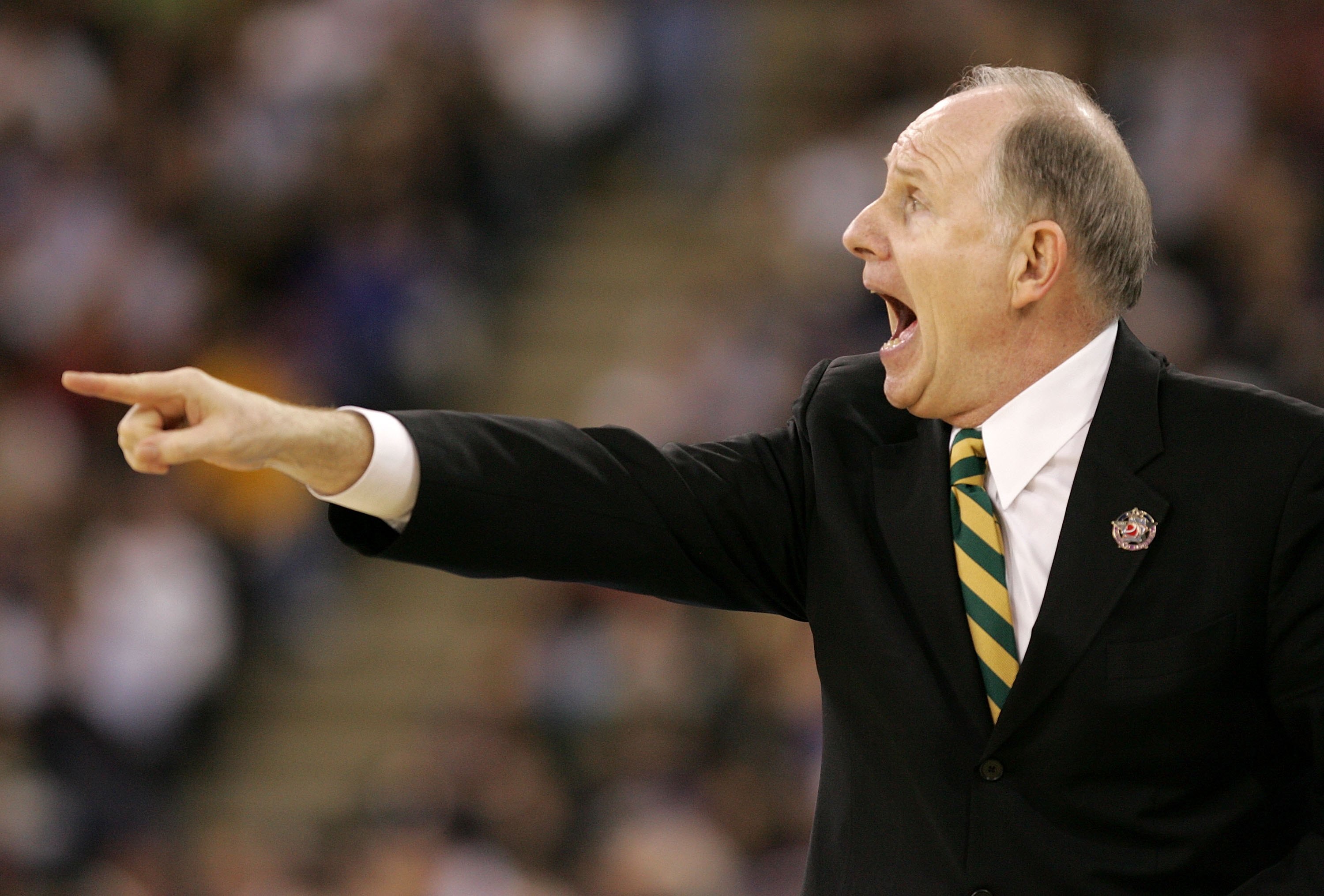INDIANAPOLIS - APRIL 01:  Head coach Jim Larranaga of the George Mason Patriots points in the second half against the Florida Gators during the semifinal game of the NCAA Men's Final Four on April 1, 2006 at the RCA Dome in Indianapolis, Indiana.  (Photo