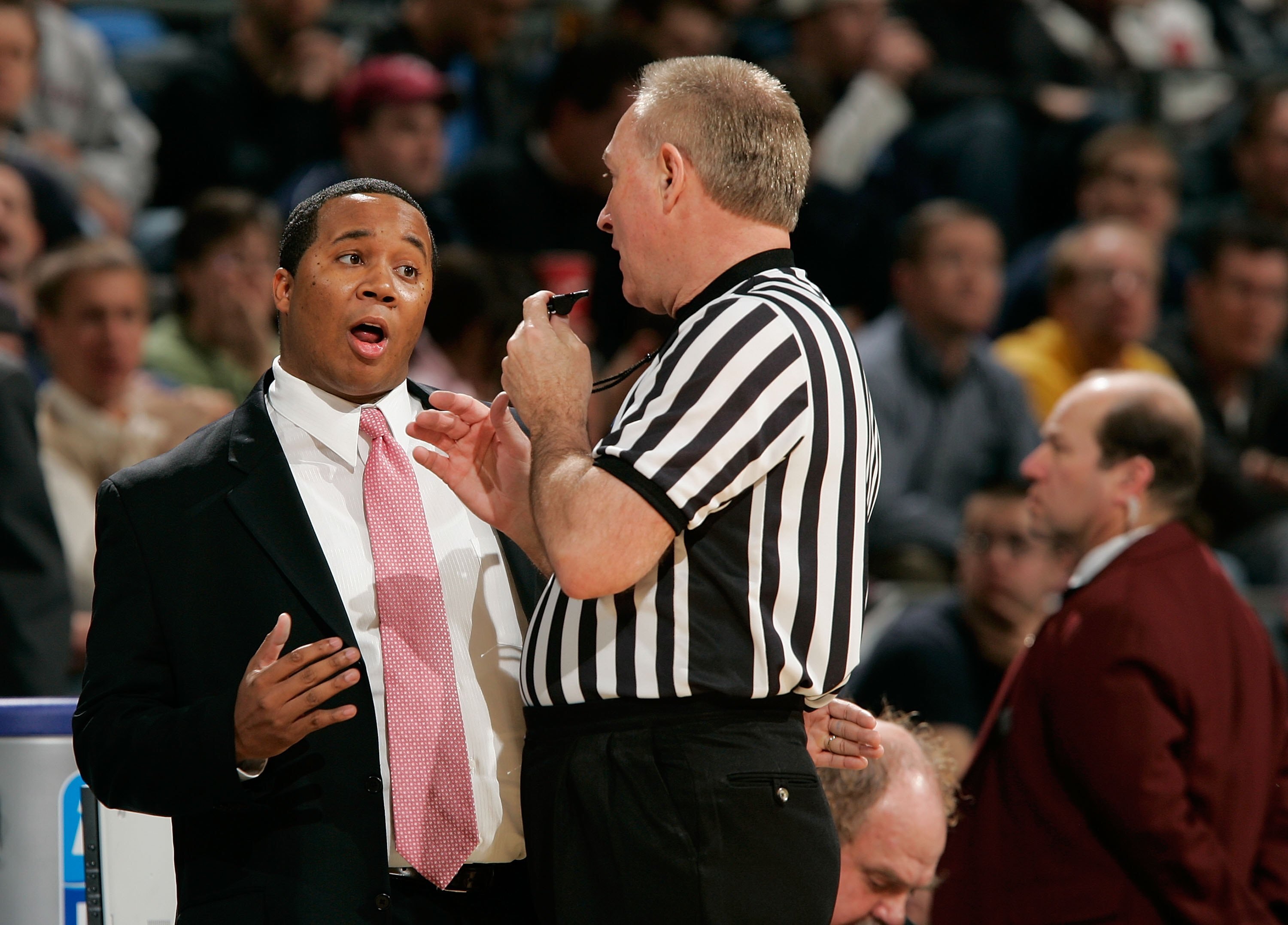 AUBURN HILLS, MI - MARCH 17:  Head coach Chris Lowery of the Southern Illinois Salukis talks to an official during First Round of the 2006 NCAA Men's Basketball Tournament against the West Virginia Mountaineers at The Palace of Auburn Hills on March 17, 2