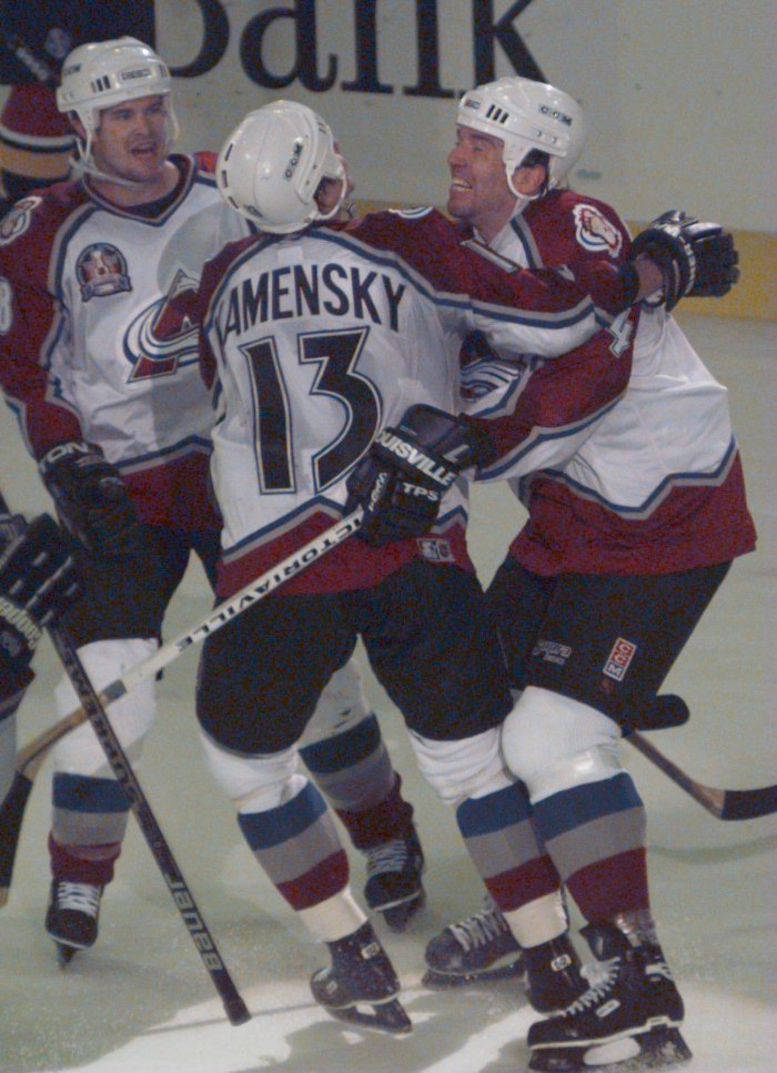 4 Jun 1996:  Defenseman Uwe Krupp (left) of the Colorado Avalanche celebrates with teammates Valeri Kamensky #13 and Adam Deadmarsh after scoring the team''s third goal in the second period during game one of the Stanley Cup Finals at McNichols Arena inDe