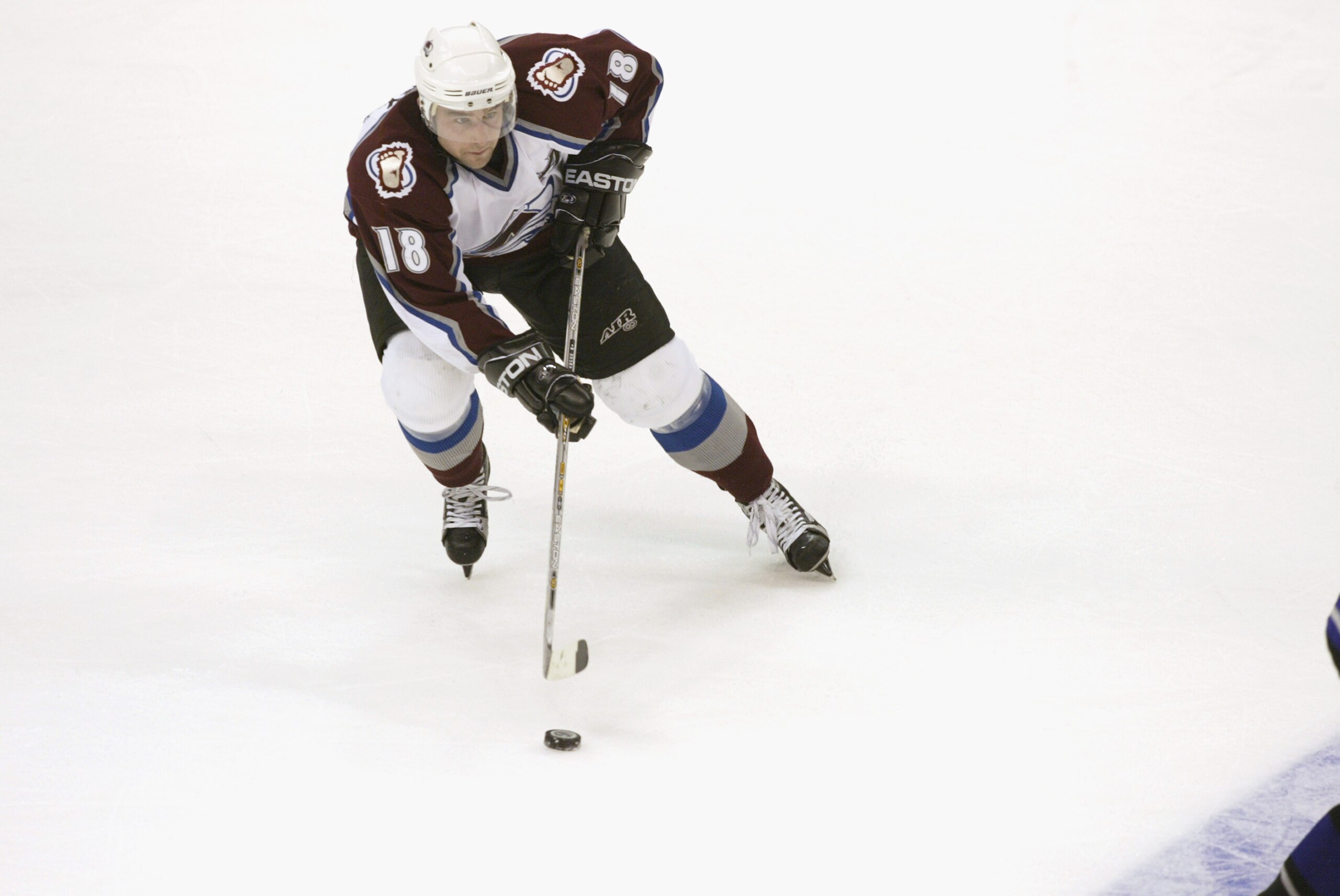 LOS ANGELES - MARCH 21:  Center Chris Drury #18 of the Colorado Avalanche skates with the puck during the game against the Los Angeles Kings  at Staples Center in Los Angeles, California on March 21, 2002.  (Photo by Jeff Gross/Getty Images/NHLI)