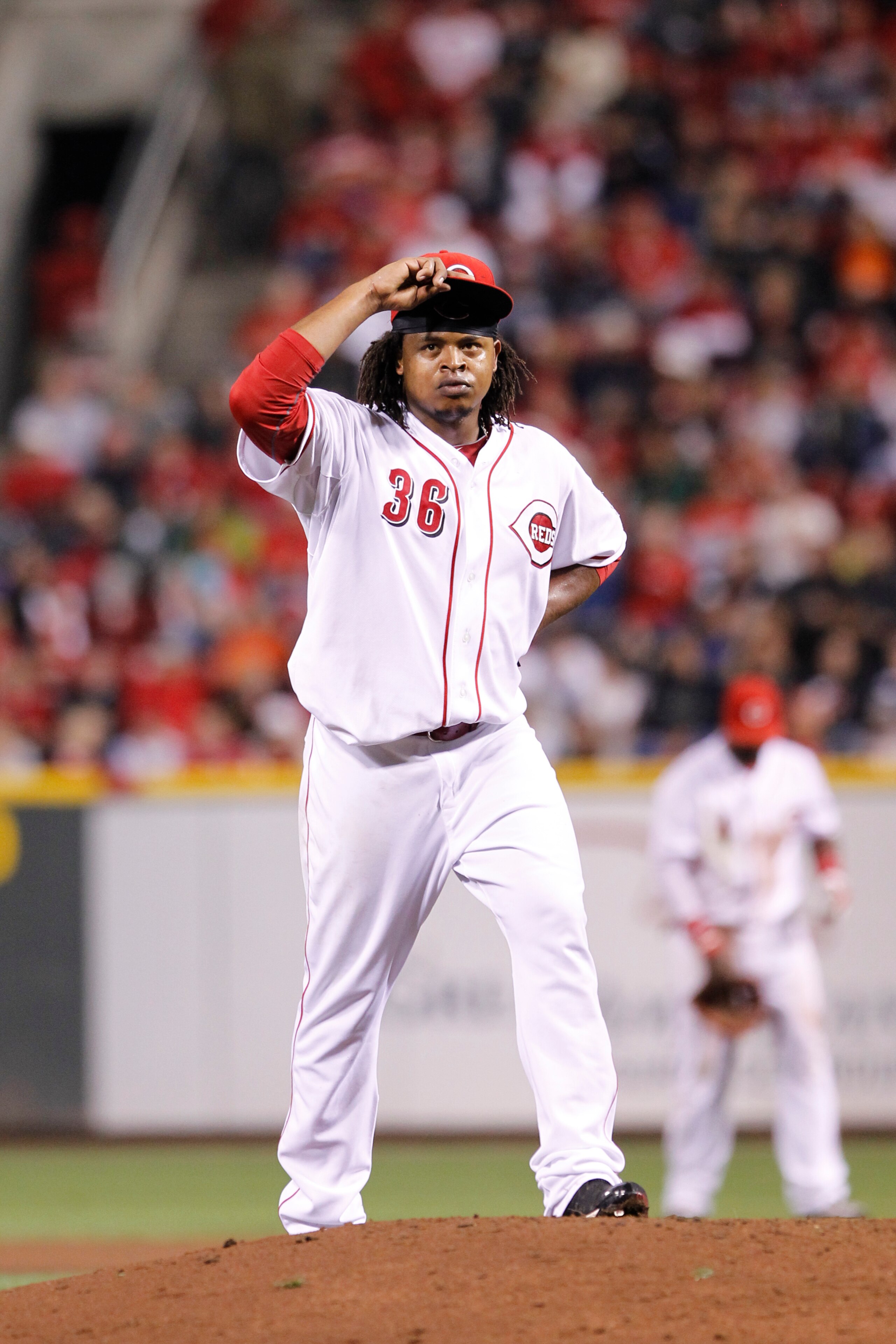 CINCINNATI, OH - SEPTEMBER 28: Edinson Volquez #36 of the Cincinnati Reds looks on against the Houston Astros at Great American Ball Park on September 28, 2010 in Cincinnati, Ohio. The Reds won 3-2 to clinch the NL Central Division title. (Photo by Joe Ro CINCINNATI, OH - SEPTEMBER 28: Edinson Volquez #36 of the Cincinnati Reds looks on against the Houston Astros at Great American Ball Park on September 28, 2010 in Cincinnati, Ohio. The Reds won 3-2 to clinch the NL Central Division title. (Photo by Joe Ro