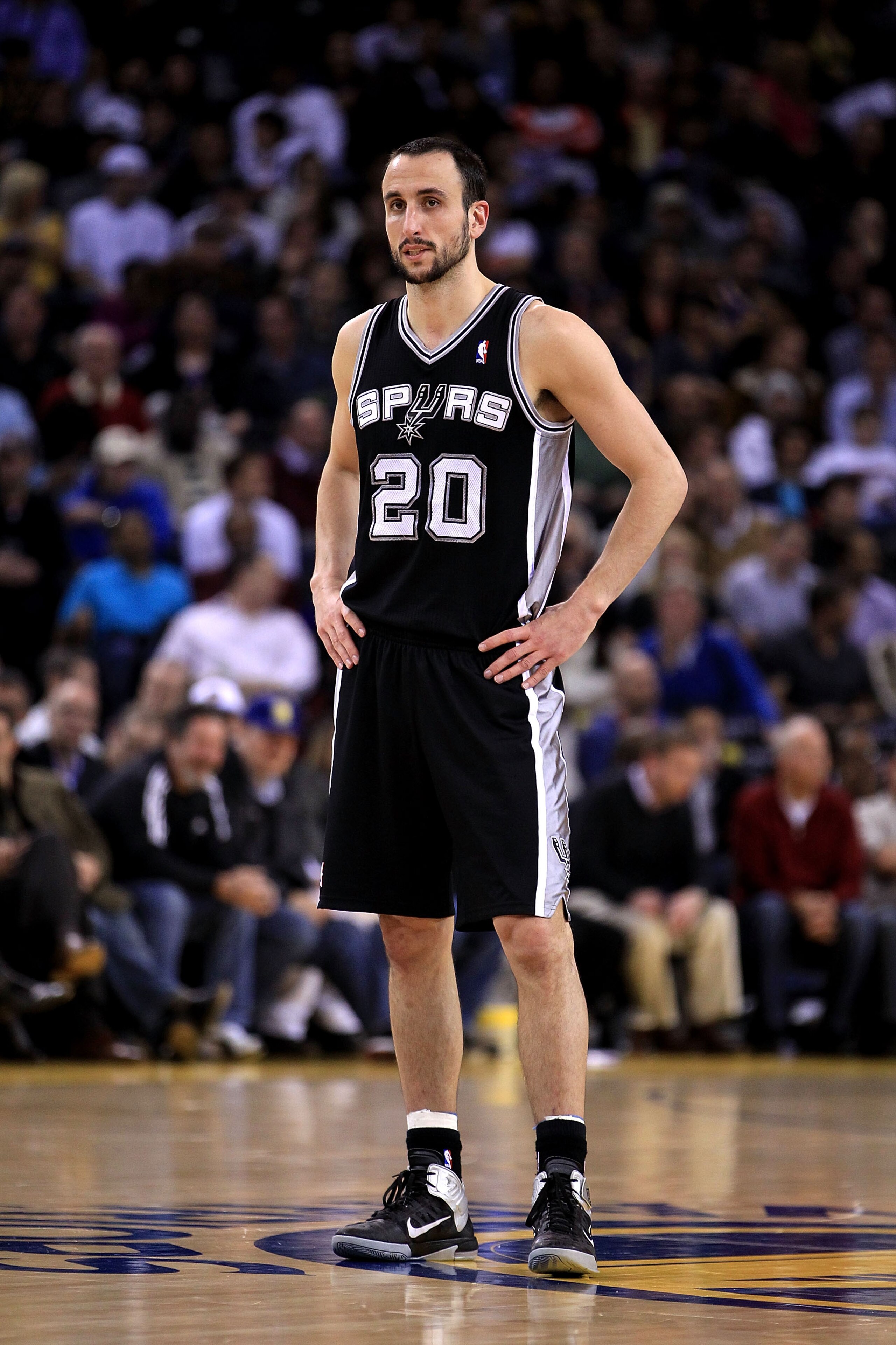 OAKLAND, CA - JANUARY 24: Manu Ginobili #20 of the San Antonio Spurs in action against the Golden State Warriors at Oracle Arena on January 24, 2011 in Oakland, California. NOTE TO USER: User expressly acknowledges and agrees that, by downloading and or OAKLAND, CA - JANUARY 24: Manu Ginobili #20 of the San Antonio Spurs in action against the Golden State Warriors at Oracle Arena on January 24, 2011 in Oakland, California. NOTE TO USER: User expressly acknowledges and agrees that, by downloading and or
