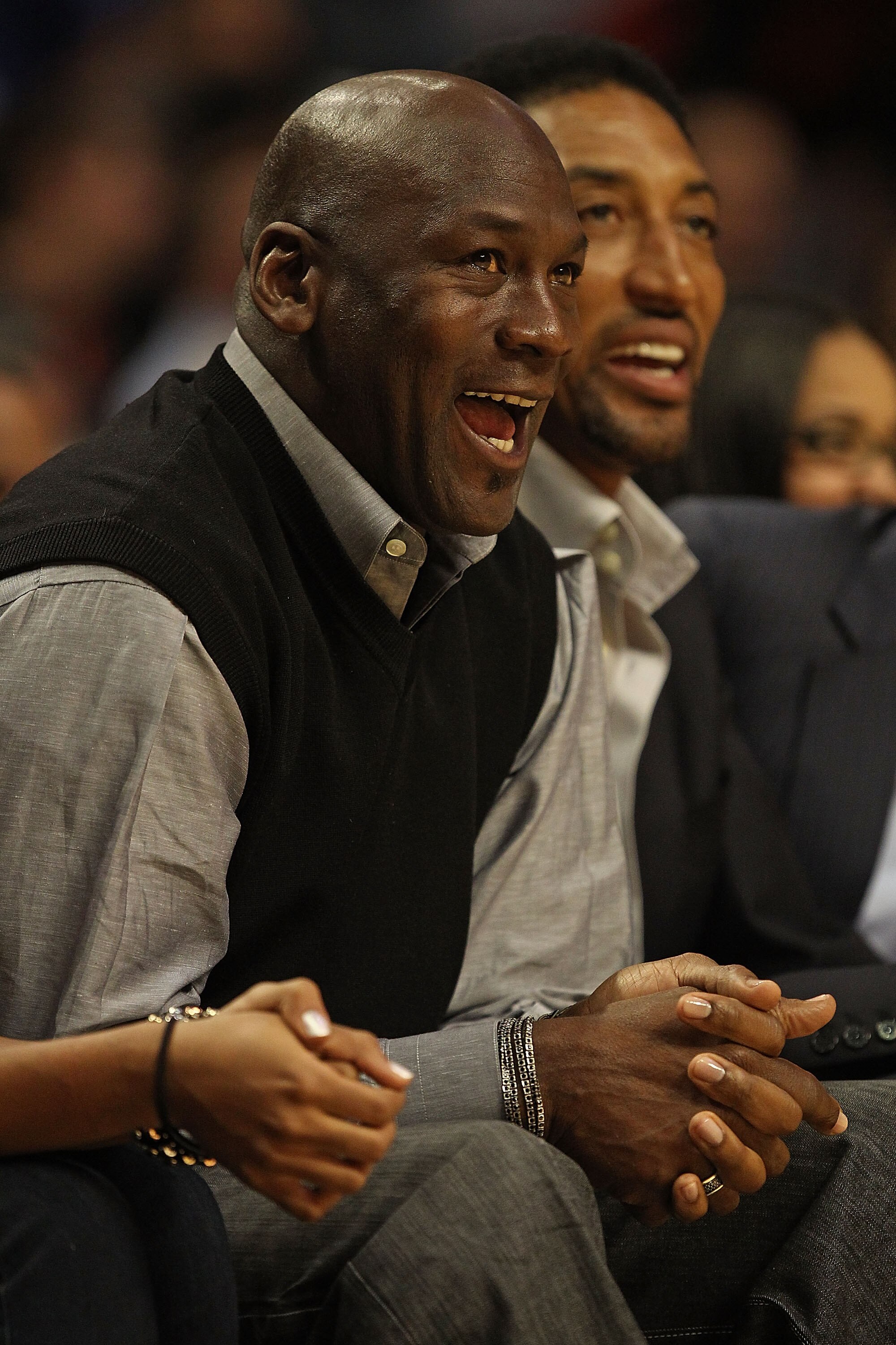 CHICAGO, IL - FEBRUARY 15: Former players Michael Jordan and Scottie Pippen of the Chicago Bulls enjoy watching a game between the Bulls and the Charlotte Bobcats at the United Center on February 15, 2011 in Chicago, Illinois. The Bulls defeated the Bobca