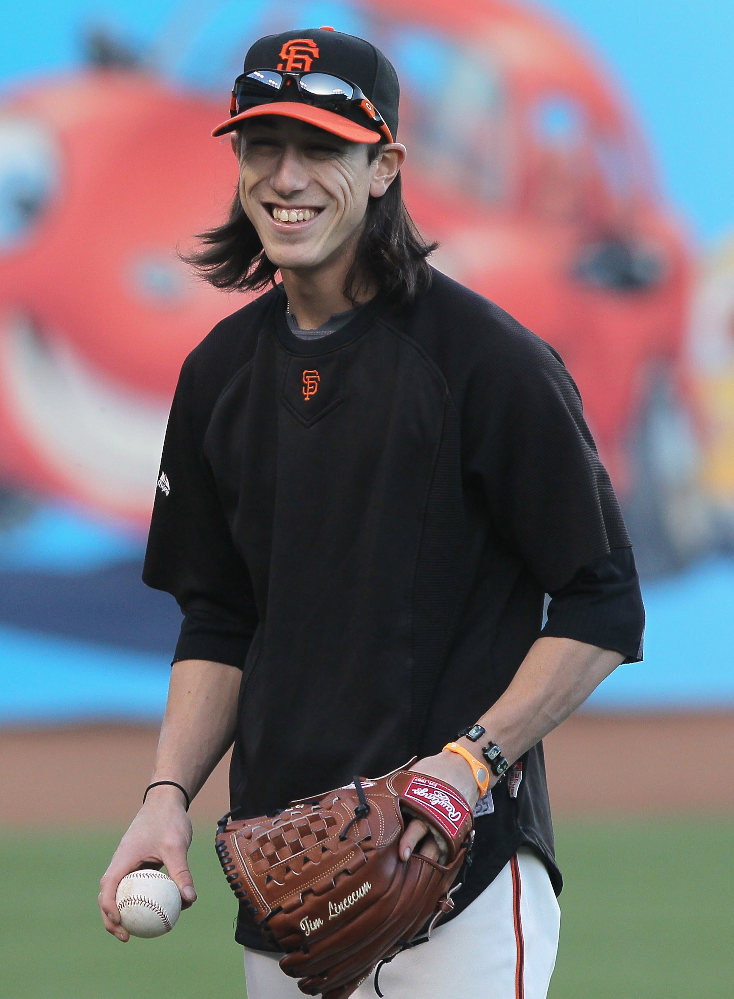 SAN FRANCISCO - OCTOBER 25: Tim Lincecum #55 of the San Francisco Giants laughs during a team workout at AT&T Park on October 25, 2010 in San Francisco, California. The Giants are preparing to face the Texas Rangers in the 2010 World Series. (Photo by J SAN FRANCISCO - OCTOBER 25: Tim Lincecum #55 of the San Francisco Giants laughs during a team workout at AT&T Park on October 25, 2010 in San Francisco, California. The Giants are preparing to face the Texas Rangers in the 2010 World Series. (Photo by J