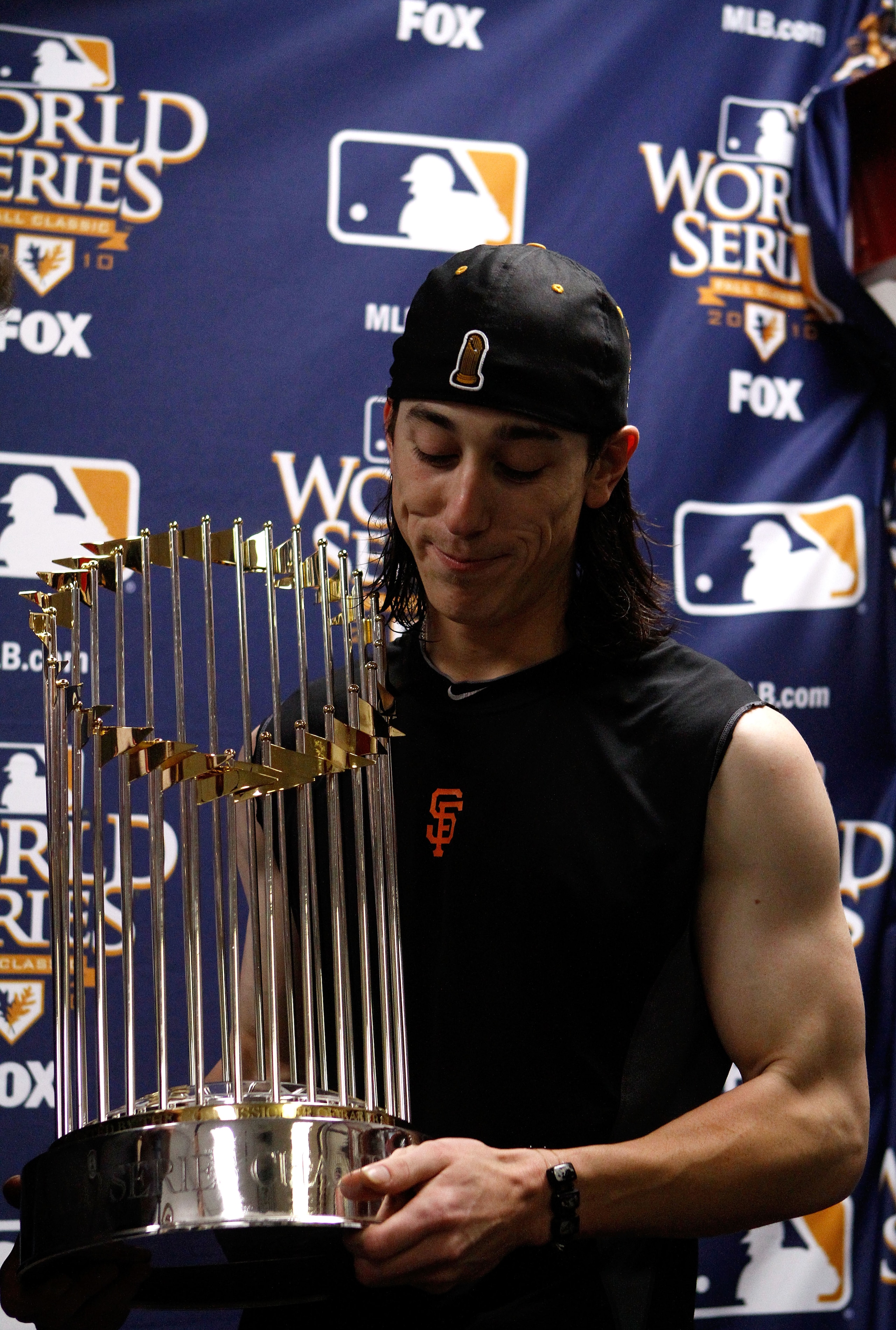 ARLINGTON, TX - NOVEMBER 01: Tim Lincecum #55 of the San Francisco Giants celebrates with the World Series trophy in the locker room after the Giants won 3-1 against the Texas Rangers in Game Five of the 2010 MLB World Series at Rangers Ballpark in Arlin ARLINGTON, TX - NOVEMBER 01: Tim Lincecum #55 of the San Francisco Giants celebrates with the World Series trophy in the locker room after the Giants won 3-1 against the Texas Rangers in Game Five of the 2010 MLB World Series at Rangers Ballpark in Arlin