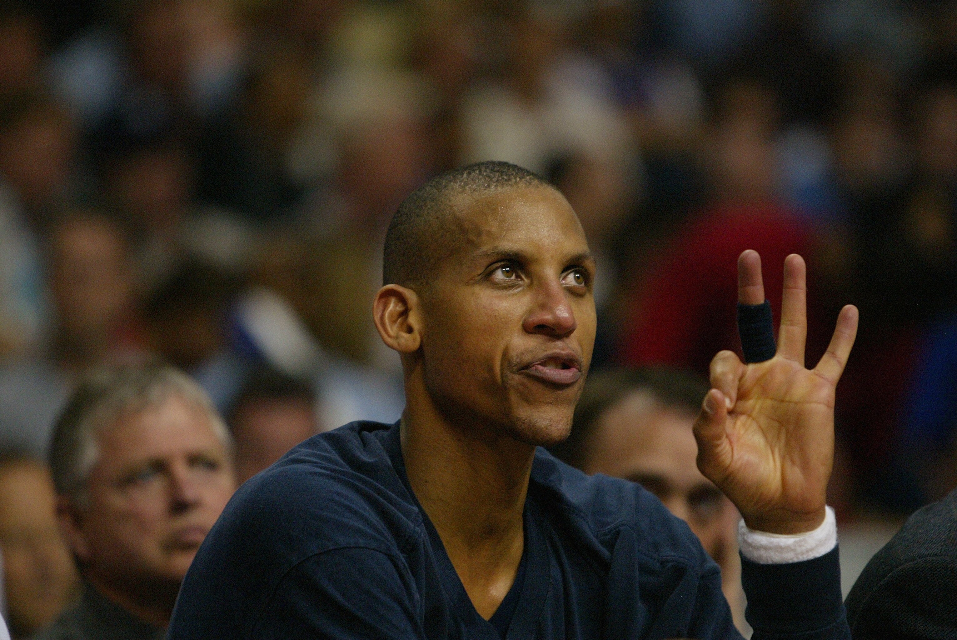 AUBURN HILLS, MI - MAY 28:  Reggie Miller #31 of the Indiana Pacers watches Game four of the Eastern Conference Finals during the 2004 NBA Playoffs against the Detroit Pistons at The Palace of Auburn Hills on May 28, 2004 in Auburn Hills, Michigan.  NOTE