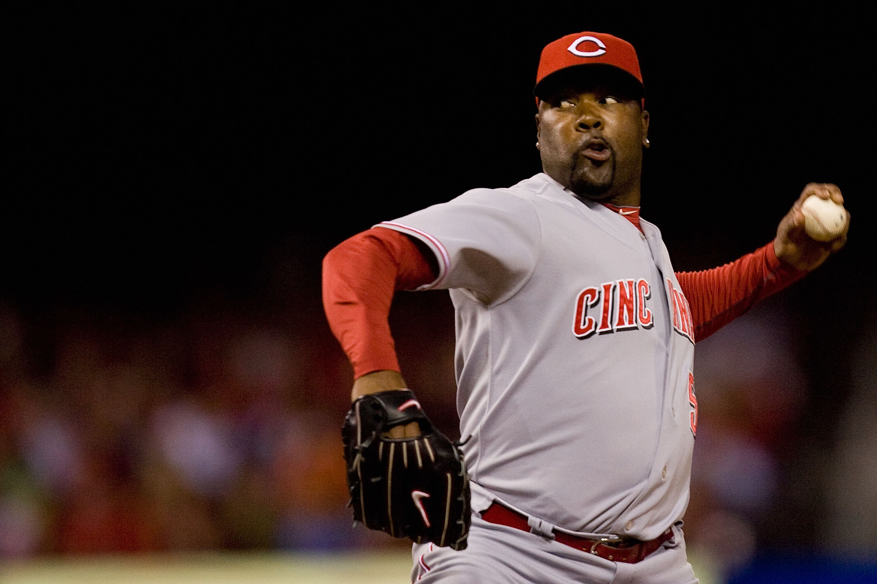 ST. LOUIS - SEPTEMBER 3: Reliever Arthur Rhodes #56 of the Cincinnati Reds pitches against the St. Louis Cardinals at Busch Stadium on September 3, 2010 in St. Louis, Missouri.  The Cardinals beat the Reds 3-2.  (Photo by Dilip Vishwanat/Getty Images)
