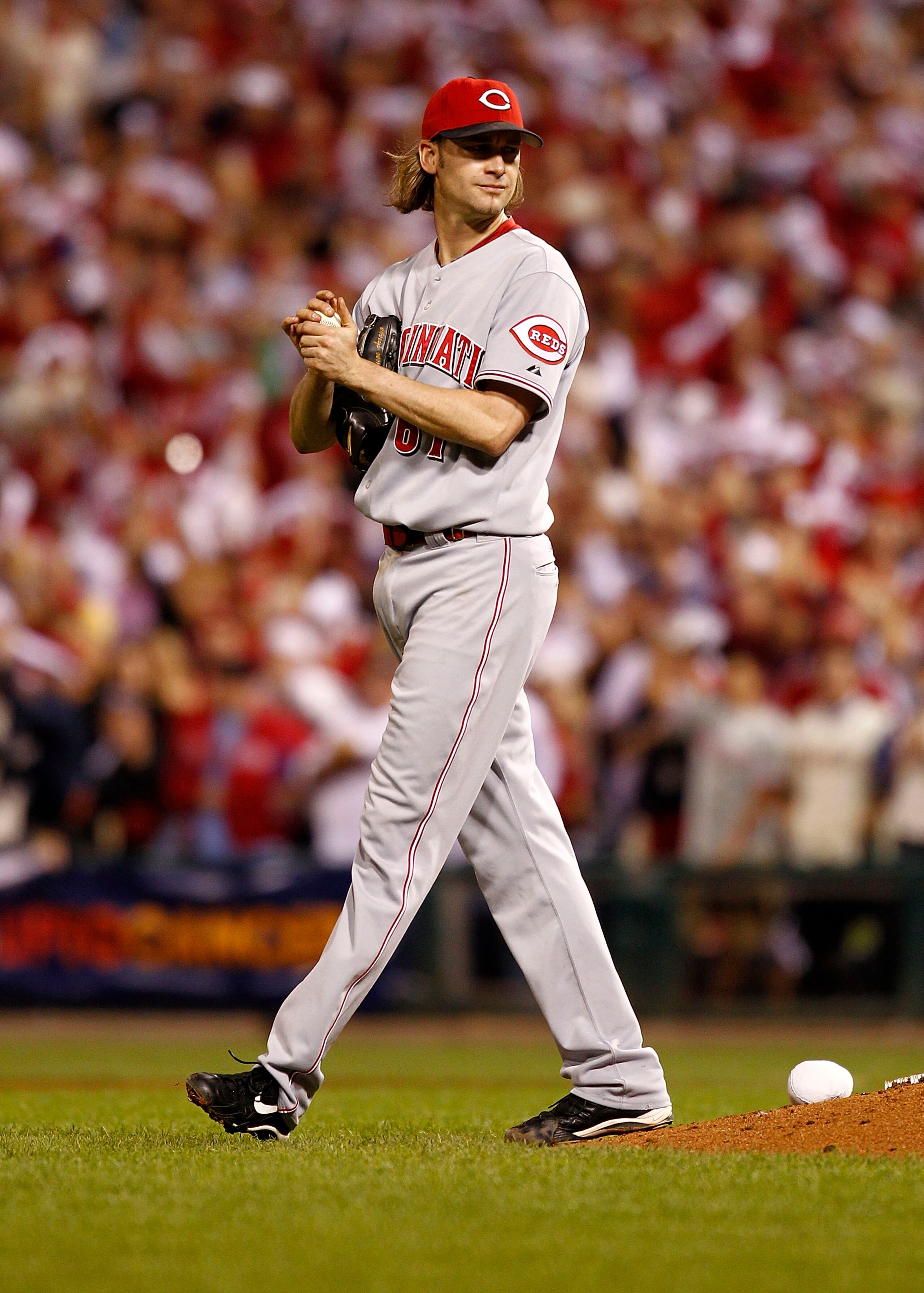 PHILADELPHIA - OCTOBER 08: Bronson Arroyo #61 of the Cincinnati Reds walks to the mound in Game 2 of the NLDS against the Philadelphia Phillies at Citizens Bank Park on October 8, 2010 in Philadelphia, Pennsylvania. (Photo by Jeff Zelevansky/Getty Image PHILADELPHIA - OCTOBER 08: Bronson Arroyo #61 of the Cincinnati Reds walks to the mound in Game 2 of the NLDS against the Philadelphia Phillies at Citizens Bank Park on October 8, 2010 in Philadelphia, Pennsylvania. (Photo by Jeff Zelevansky/Getty Image