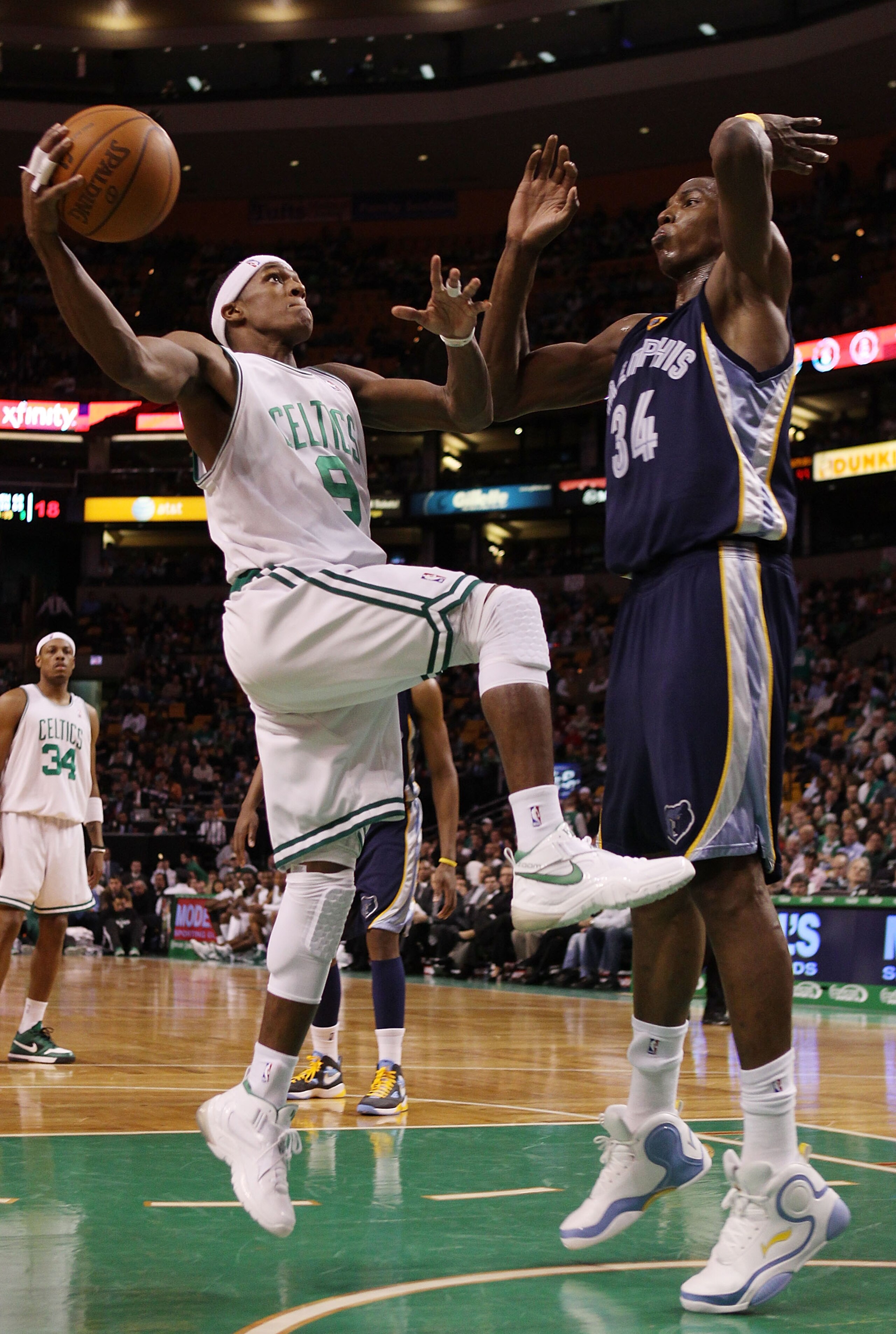 BOSTON - MARCH 10: Rajon Rondo #9 of the Boston Celtics heads for the net as Hasheem Thabeet #34 of the Memphis Grizzlies defends on March 10, 2010 at the TD Garden in Boston, Massachusetts. The Grizzlies defeated the Celtics 111-91. NOTE TO USER: User BOSTON - MARCH 10: Rajon Rondo #9 of the Boston Celtics heads for the net as Hasheem Thabeet #34 of the Memphis Grizzlies defends on March 10, 2010 at the TD Garden in Boston, Massachusetts. The Grizzlies defeated the Celtics 111-91. NOTE TO USER: User