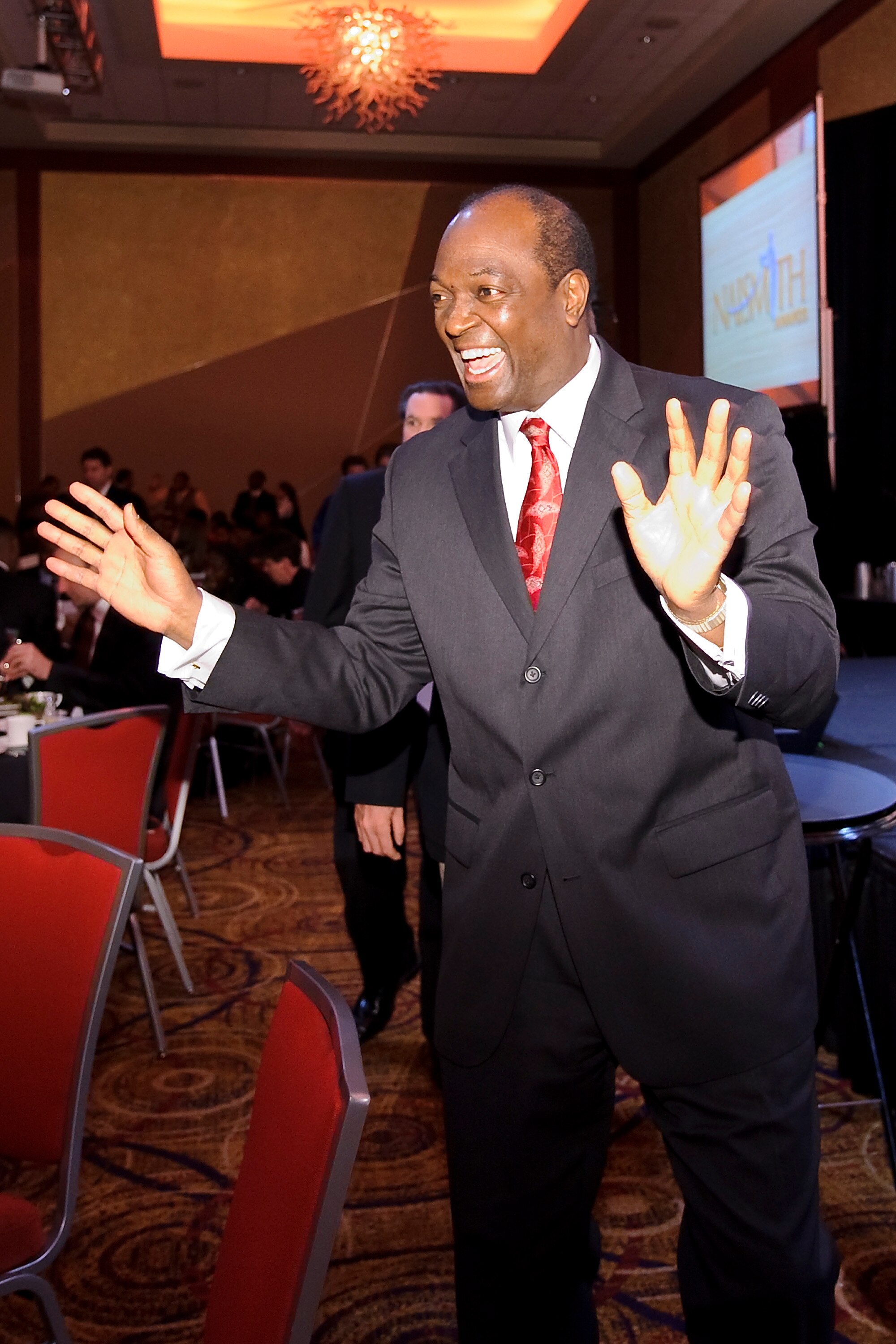ATLANTA - MARCH 23: Mike Glenn reacts to seeing Bob Brannun at the Atlanta Tipoff Club Naismith Award Banquet at the Cobb Energy Performing Arts Center on March 23, 2010 in Atlanta, Georgia. (Paul Abell/Getty Images for Naismith Award)