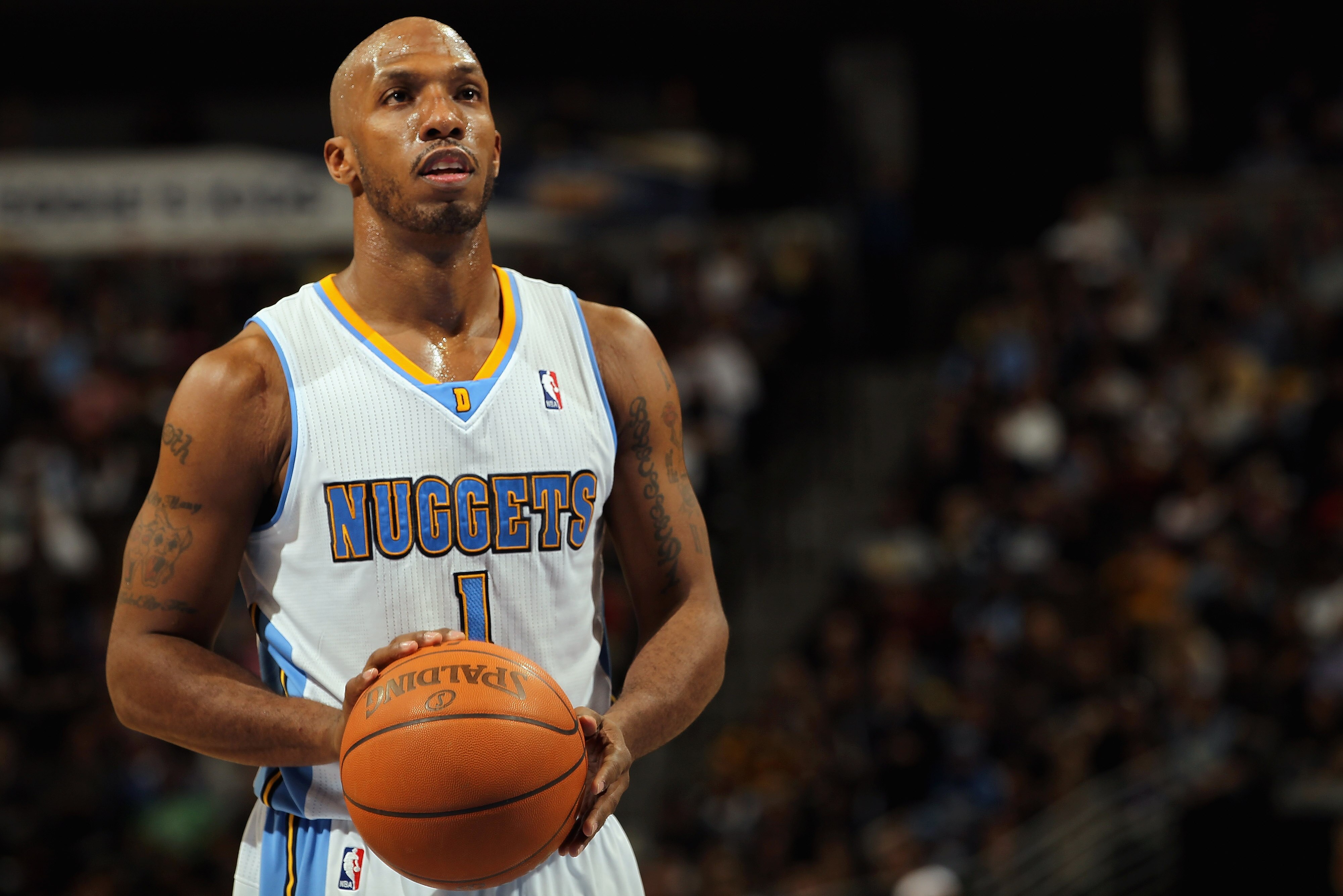 DENVER, CO - FEBRUARY 10:  Chauncey Billups #1 of the Denver Nuggets takes a free throw against the Dallas Mavericks during NBA action at the Pepsi Center on February 10, 2011 in Denver, Colorado. The Nuggets defeated the Mavericks 121-120. NOTE TO USER:
