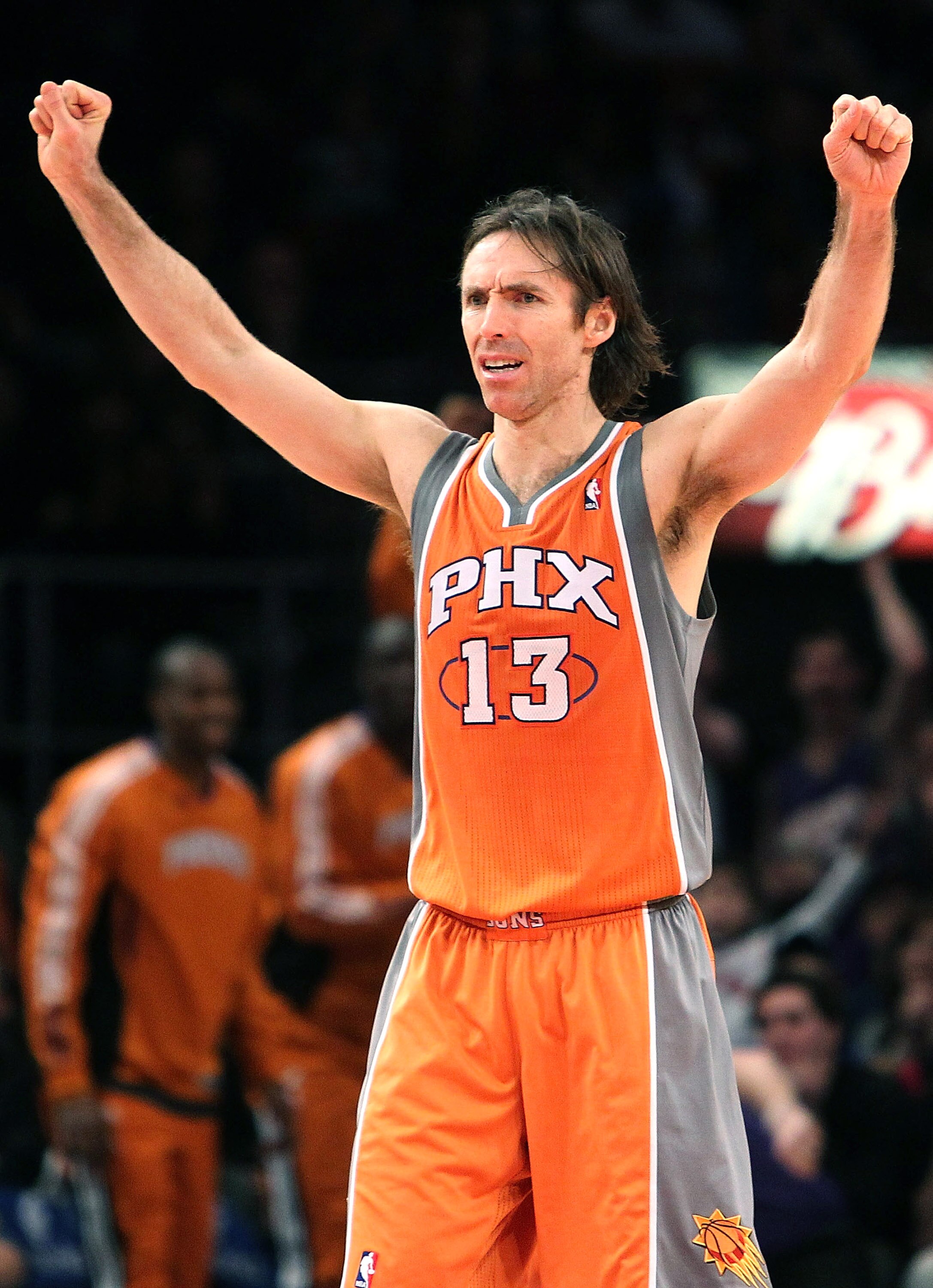 NEW YORK, NY - JANUARY 17:  Steve Nash #13 of the Phoenix Suns celebrates a basket against the New York Knicks at Madison Square Garden on January 17, 2011 in New York City. NOTE TO USER: User expressly acknowledges and agrees that, by downloading and or