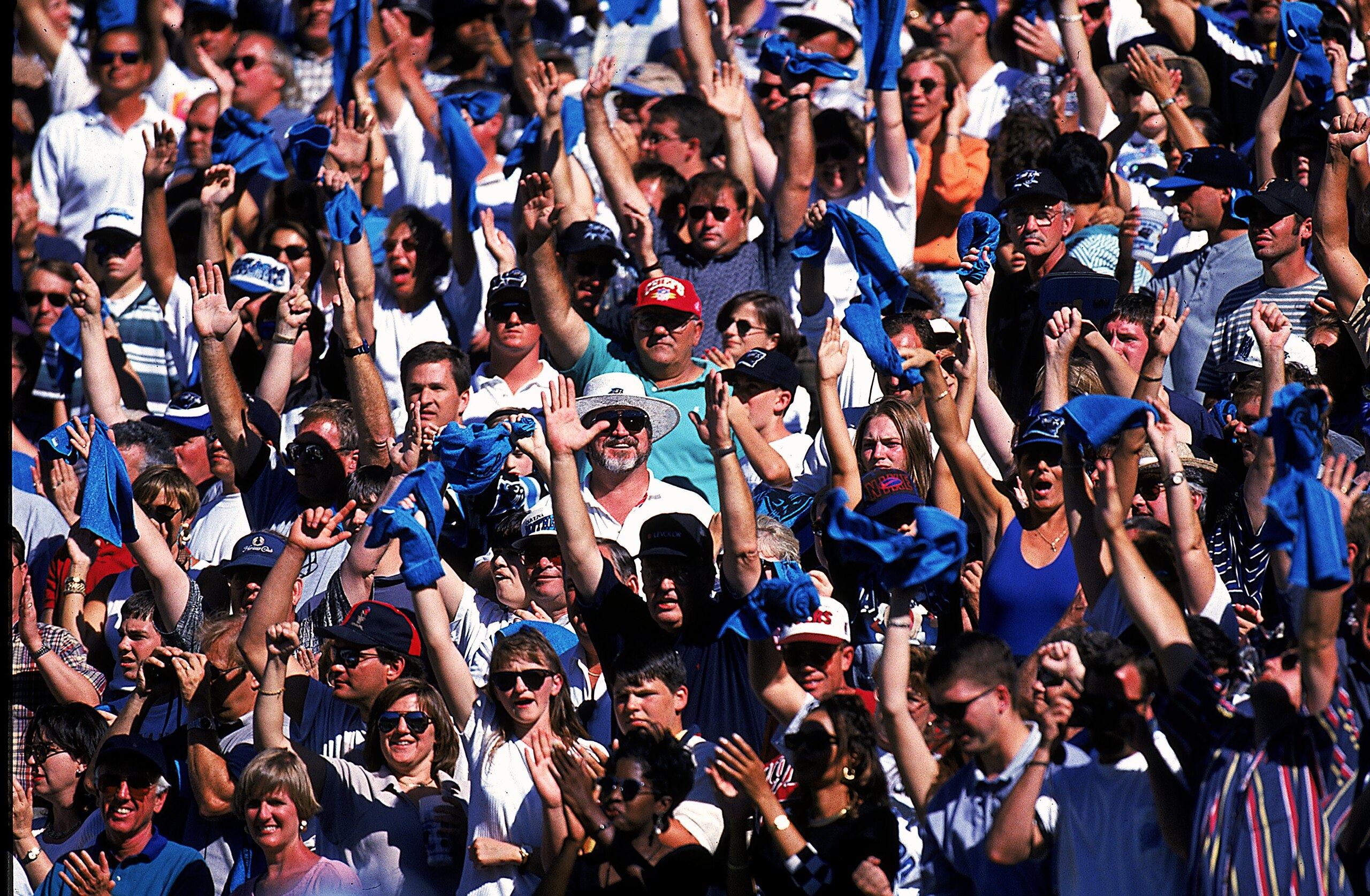 22 Sep 1996: Fans cheer in the crowd during a game between the San Francisco 49ers and the Carolina Panthers at the Ericsson Stadium in Charlotte, North Carolina. The Panthers defeated the 49ers 23-7. Mandatory Credit: Doug Pensinger  /Allsport