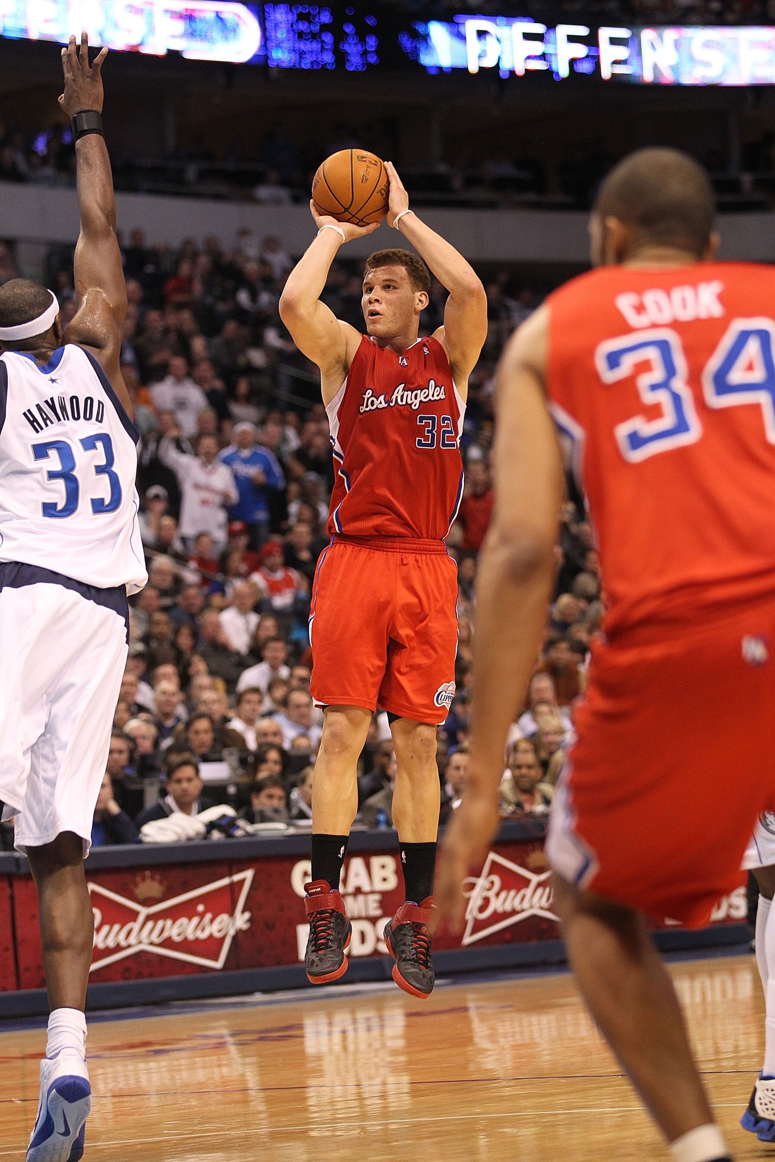 DALLAS, TX - JANUARY 25:  Forward Blake Griffin #32 of the Los Angeles Clippers takes a shot against Brendan Haywood #33 of the Dallas Mavericks at American Airlines Center on January 25, 2011 in Dallas, Texas.  NOTE TO USER: User expressly acknowledges a
