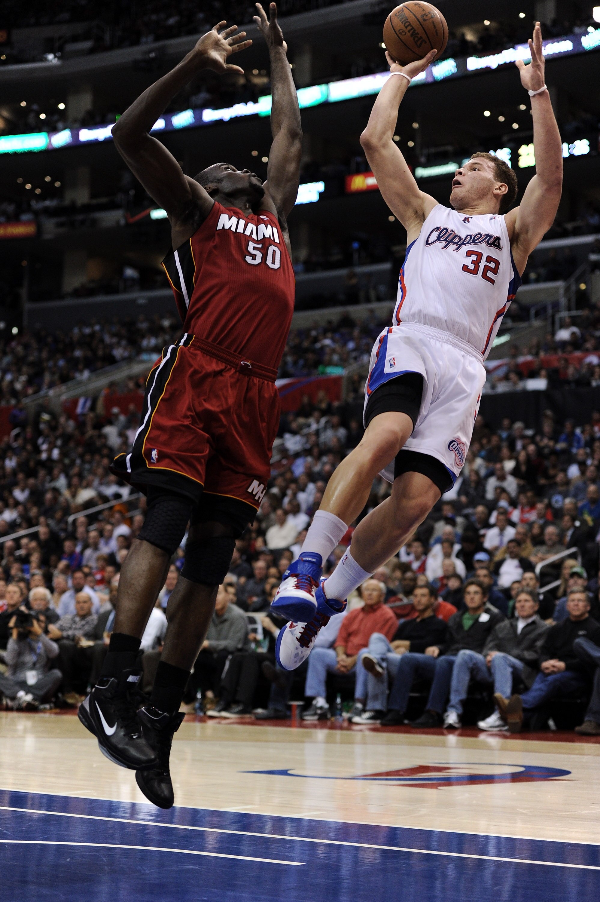 LOS ANGELES, CA - JANUARY 12:  Blake Griffin #32 of the Los Angeles Clippers shoots a jumper over Joel Anthony #50 of the Miami Heat during the first half at the Staples Center on January 12, 2011 in Los Angeles, California.  NOTE TO USER: User expressly