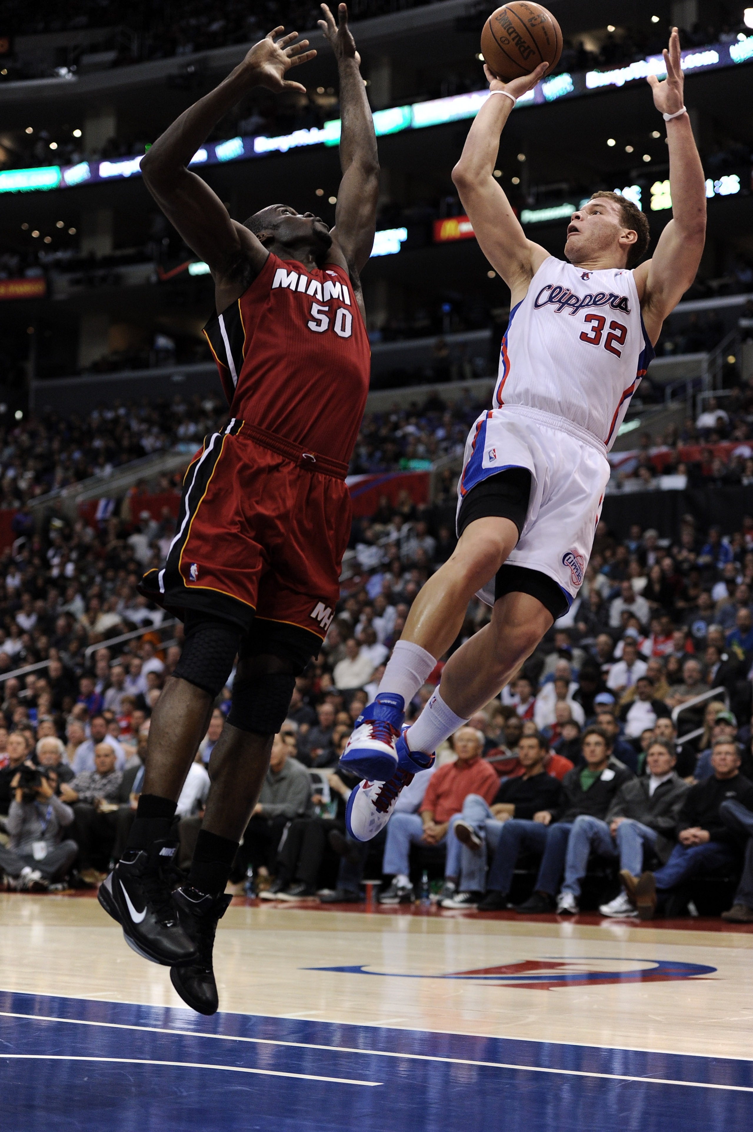 LOS ANGELES, CA - JANUARY 12:  Blake Griffin #32 of the Los Angeles Clippers shoots a jumper over Joel Anthony #50 of the Miami Heat during the first half at the Staples Center on January 12, 2011 in Los Angeles, California.  NOTE TO USER: User expressly