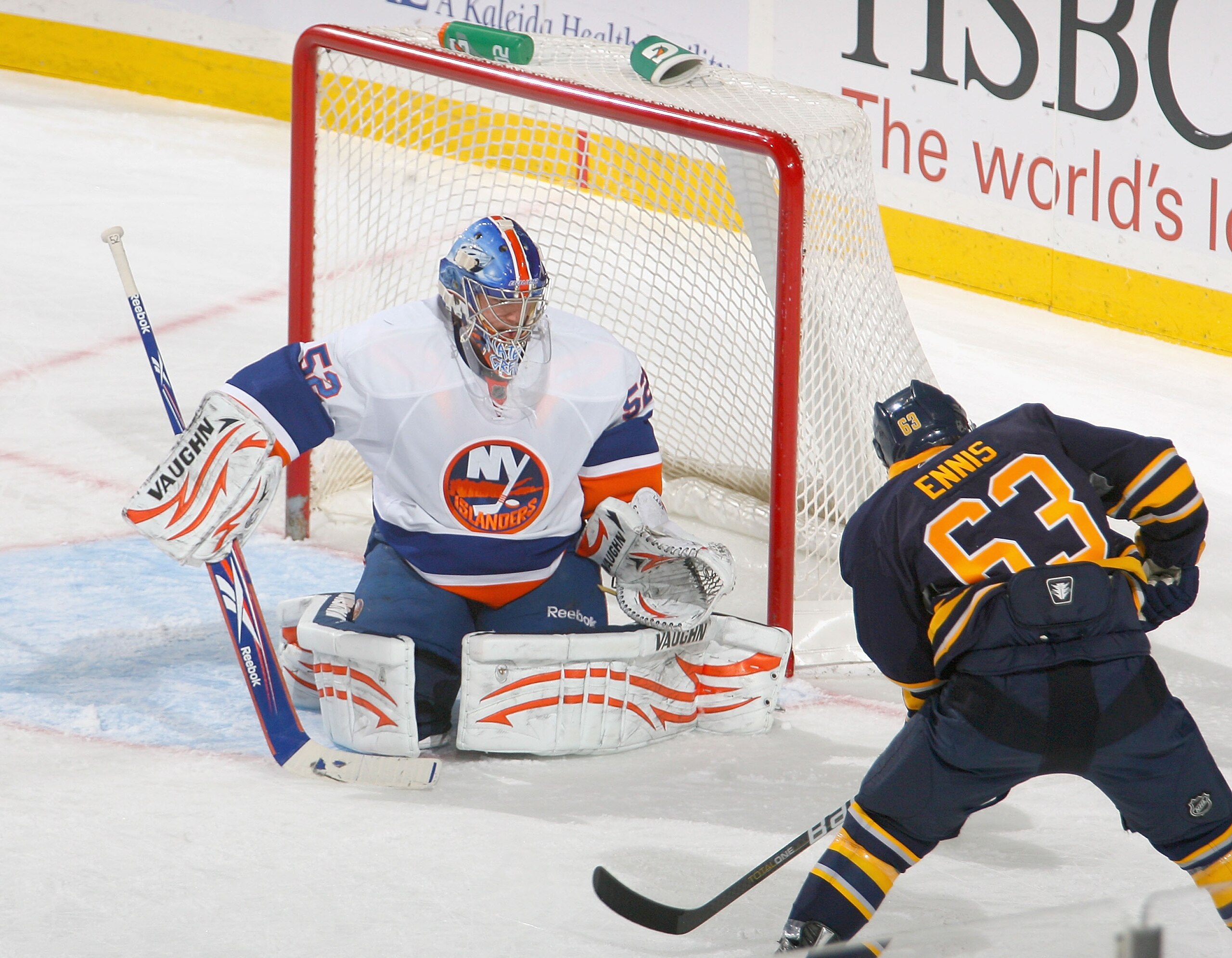 BUFFALO, NY - JANUARY 21:  Nathan Lawson #52 of the New York Islanders defends the goal against Tyler Ennis #63 of the Buffalo Sabres at HSBC Arena on January 21, 2011 in Buffalo, New York. New York won 5-2.  (Photo by Rick Stewart/Getty Images)