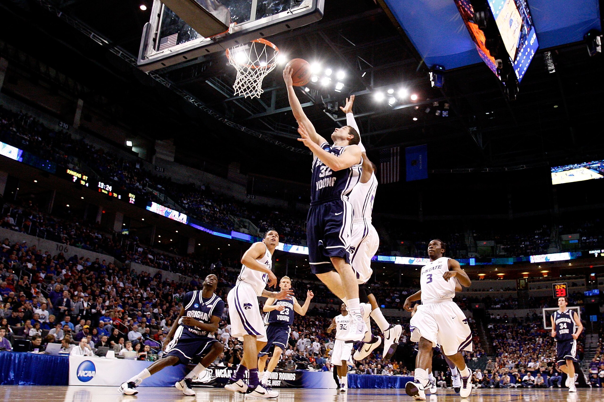 OKLAHOMA CITY - MARCH 20:  Jimmer Fredette #32 of the Brigham Young Cougars drives for a shot attempt against the Kansas State Wildcats during the second round of the 2010 NCAA men's basketball tournament at Ford Center on March 20, 2010 in Oklahoma City,
