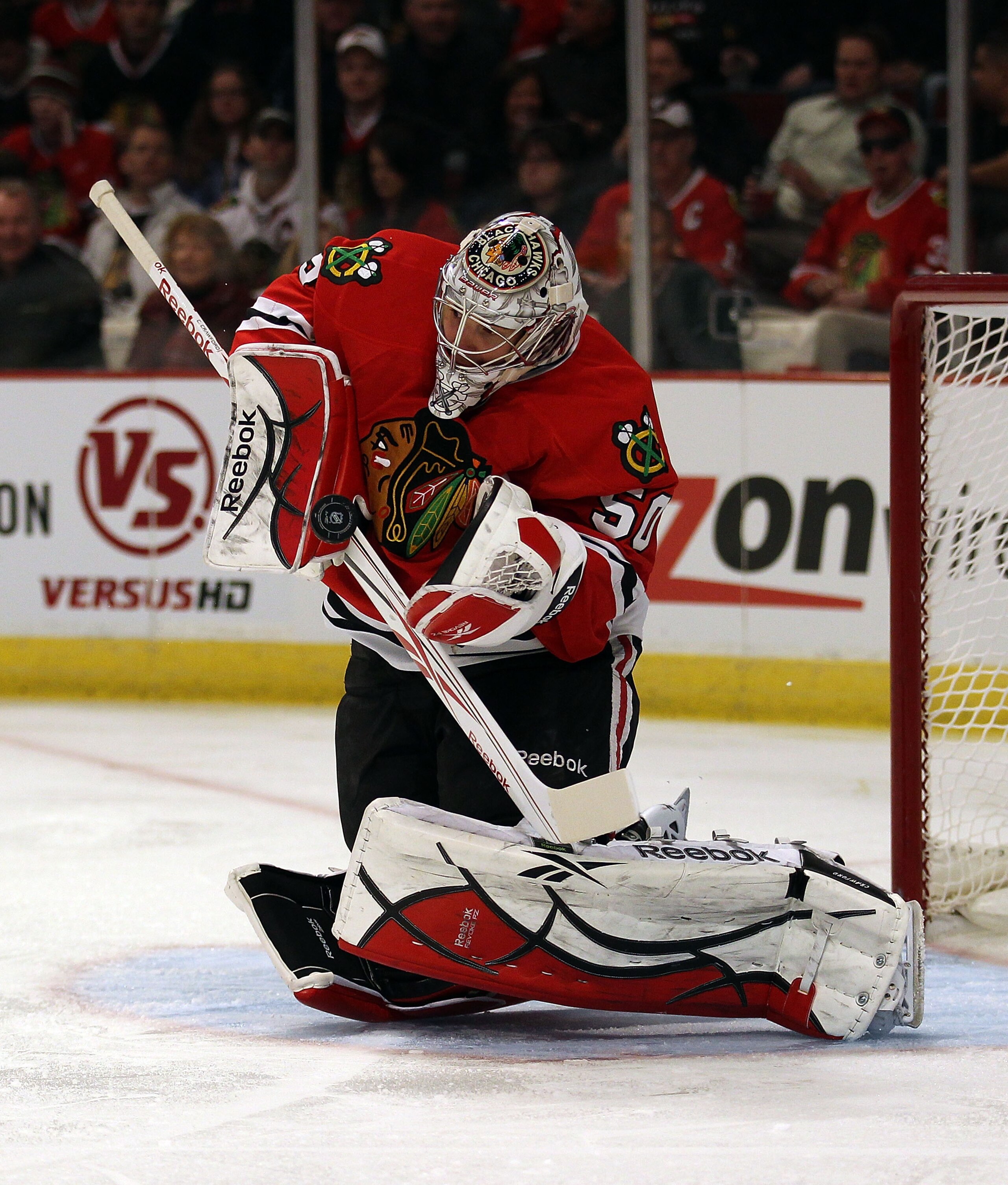 CHICAGO, IL - FEBRUARY 16: Corey Crawford #50 of the Chicago Blackhawks makes a save against the Minnesota Wild at the United Center on February 16, 2011 in Chicago, Illinois. (Photo by Jonathan Daniel/Getty Images)