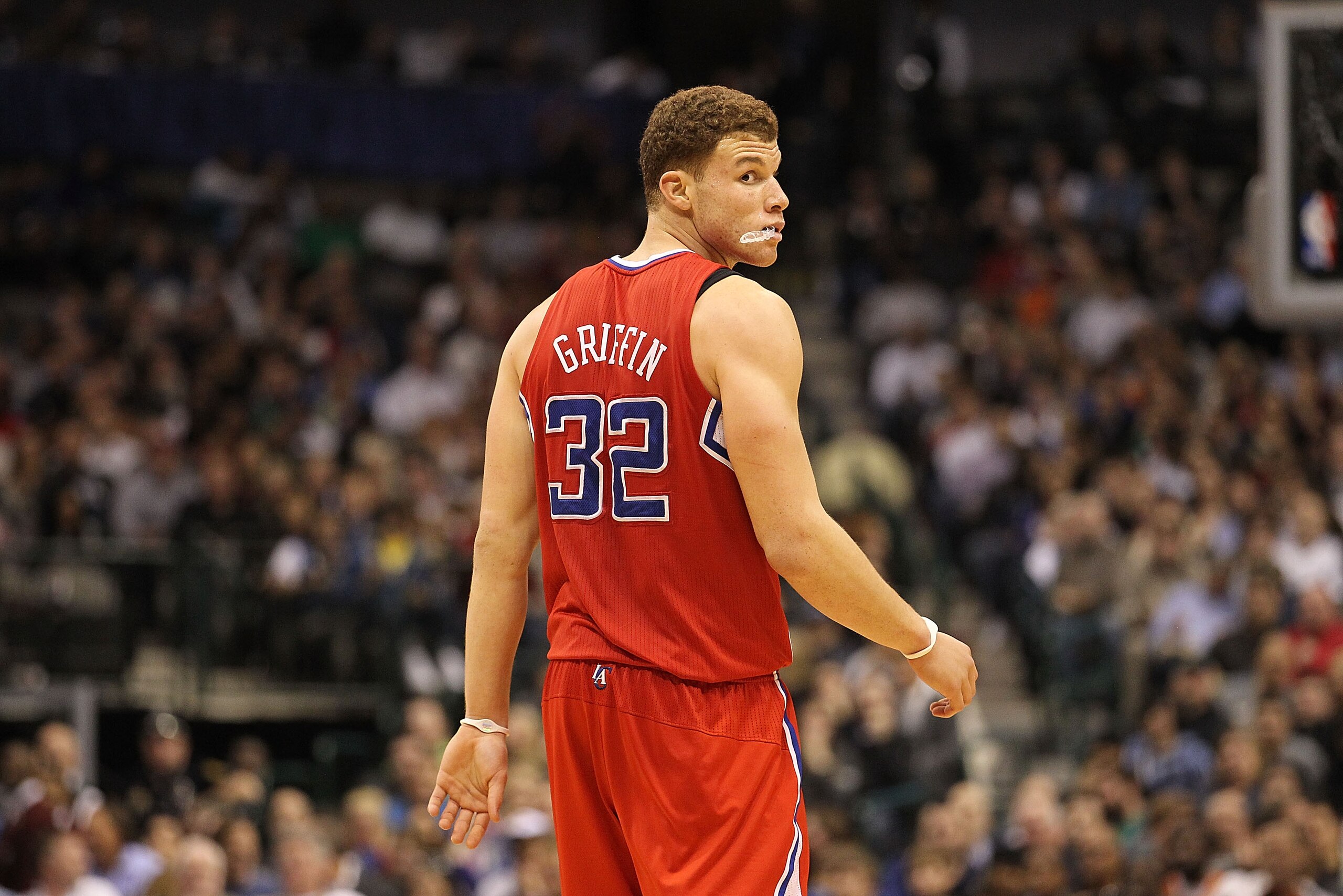 DALLAS, TX - JANUARY 25:  Forward Blake Griffin #32 of the Los Angeles Clippers takes a shot against Brendan Haywood #33 of the Dallas Mavericks at American Airlines Center on January 25, 2011 in Dallas, Texas.  NOTE TO USER: User expressly acknowledges a