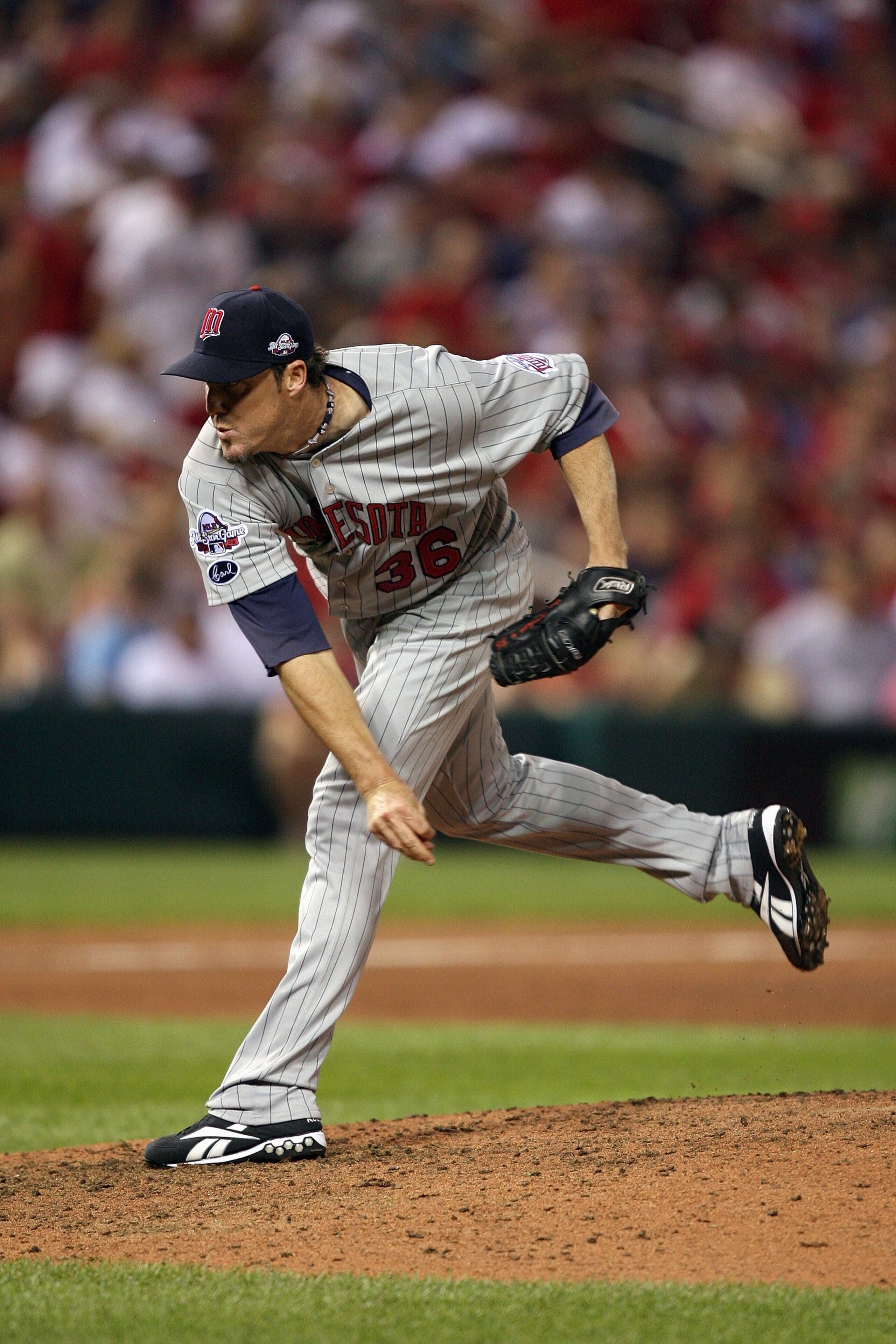 ST. LOUIS, MO - JULY 14:  American League All-Star Joe Nathan of the Minnesota Twins pitches during the 2009 MLB All-Star Game at Busch Stadium on July 14, 2009 in St Louis, Missouri. (Photo by Dilip Vishwanat/Getty Images)