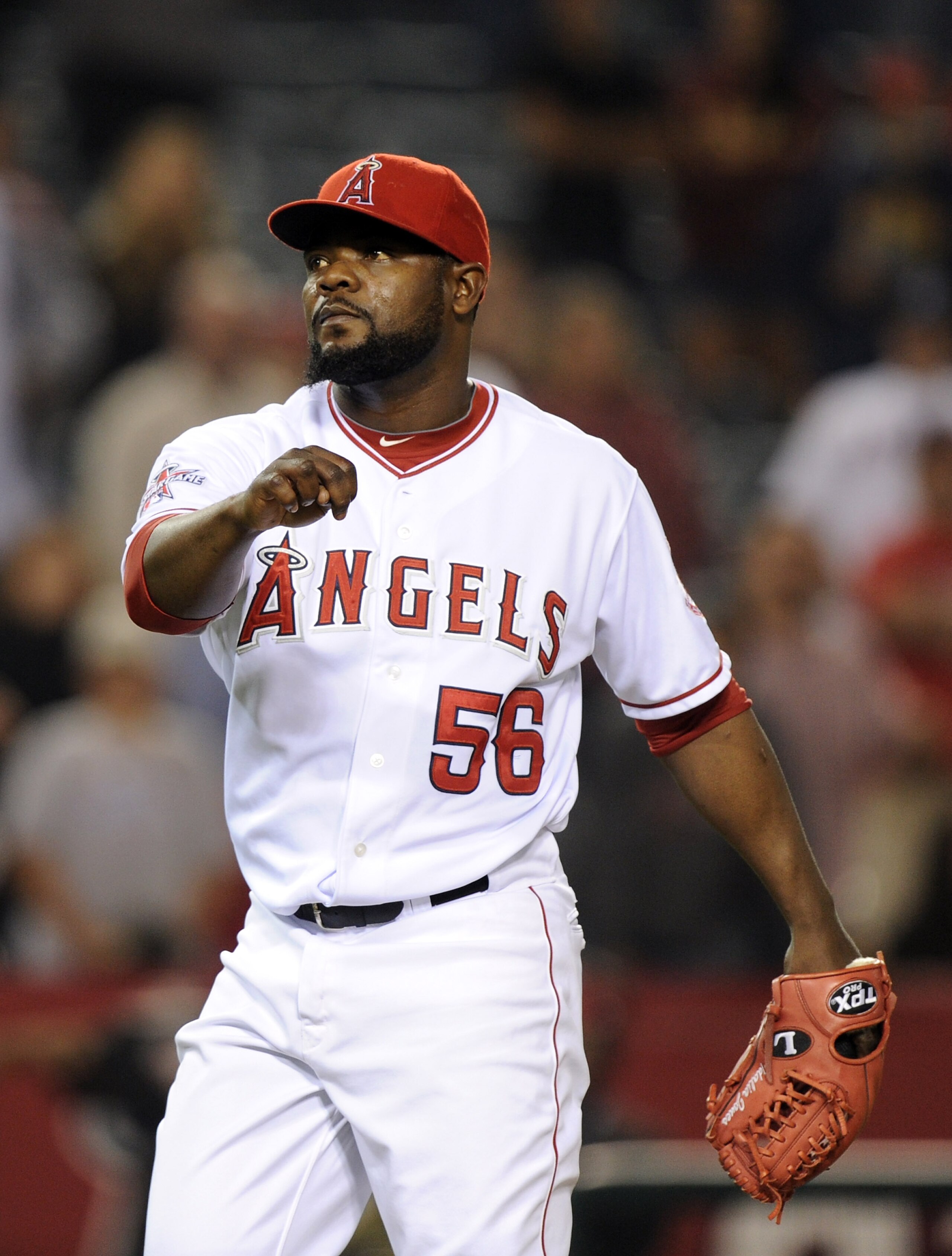 ANAHEIM, CA - SEPTEMBER 20:  Fernando Rodney #56 of the Los Angeles Angels of Anaheim reacts to a 7-4 win over the Texas Rangers during the ninth inning at Angel Stadium on September 20, 2010 in Anaheim, California.  (Photo by Harry How/Getty Images)