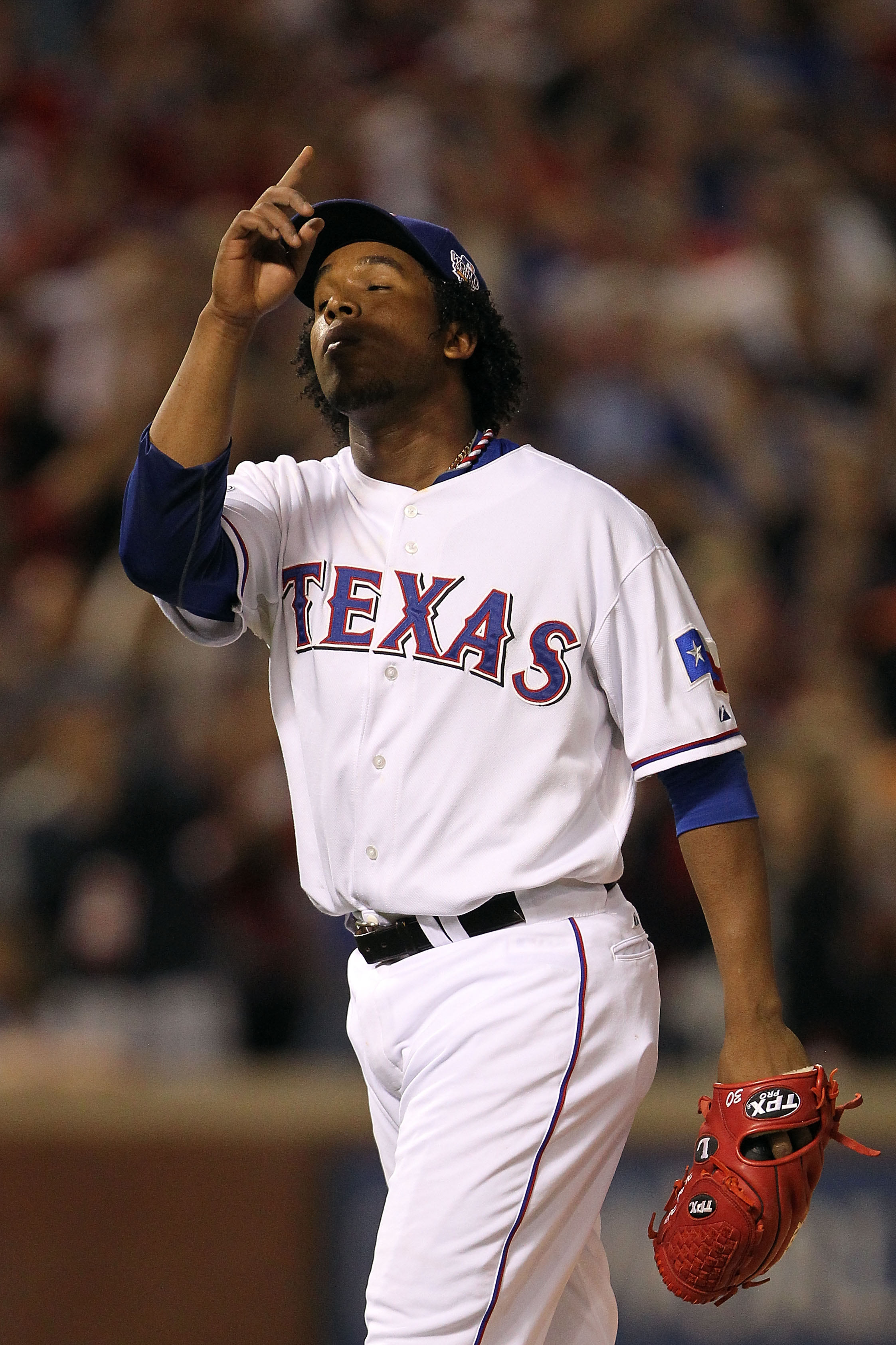 ARLINGTON, TX - OCTOBER 30:  Neftali Feliz #30 of the Texas Rangers reacts after he recorded the final out of their 4-2 win against the San Francisco Giants in Game Three of the 2010 MLB World Series at Rangers Ballpark in Arlington on October 30, 2010 in