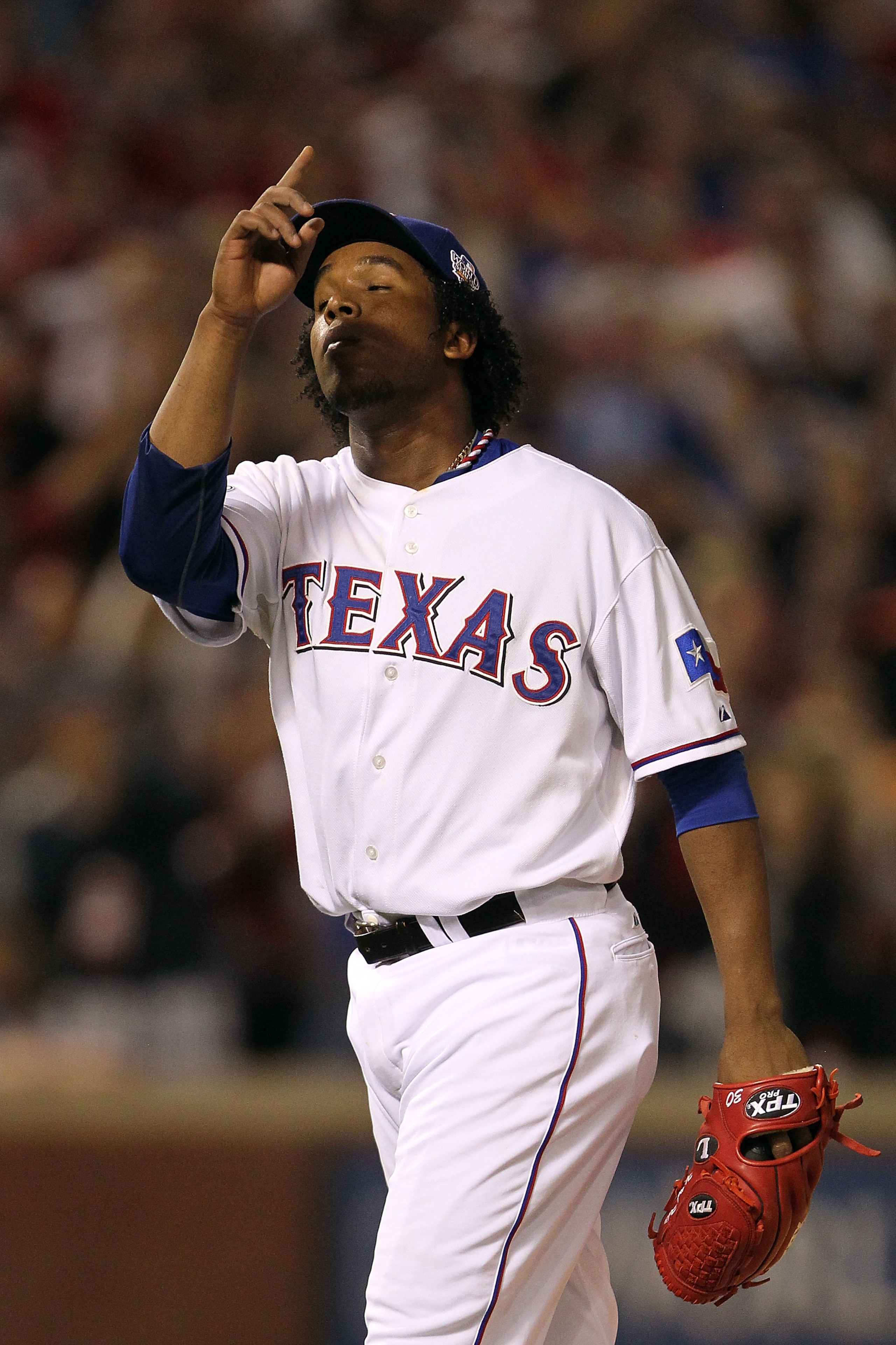 ARLINGTON, TX - OCTOBER 30:  Neftali Feliz #30 of the Texas Rangers reacts after he recorded the final out of their 4-2 win against the San Francisco Giants in Game Three of the 2010 MLB World Series at Rangers Ballpark in Arlington on October 30, 2010 in