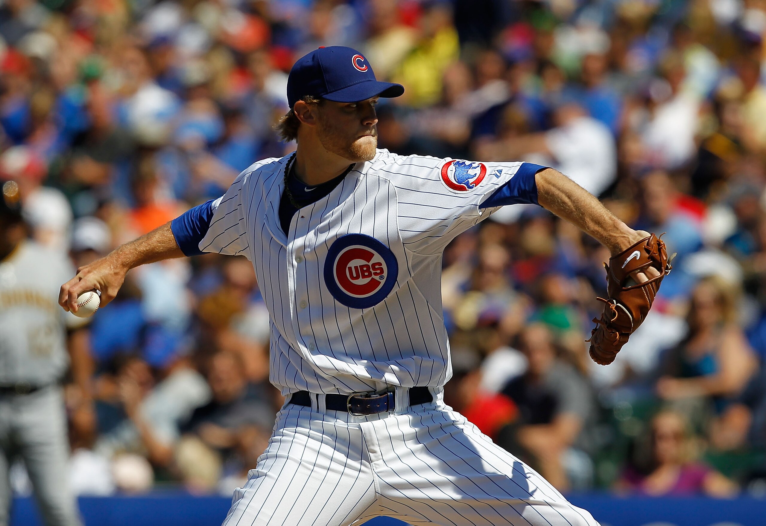 CHICAGO - JUNE 30: Andrew Cashner #4 of the Chicago Cubs pitches against the Pittsburgh Pirates at Wrigley Field on June 30, 2010 in Chicago, Illinois. The Pirates defeated the Cubs 2-0. (Photo by Jonathan Daniel/Getty Images) CHICAGO - JUNE 30: Andrew Cashner #4 of the Chicago Cubs pitches against the Pittsburgh Pirates at Wrigley Field on June 30, 2010 in Chicago, Illinois. The Pirates defeated the Cubs 2-0. (Photo by Jonathan Daniel/Getty Images)