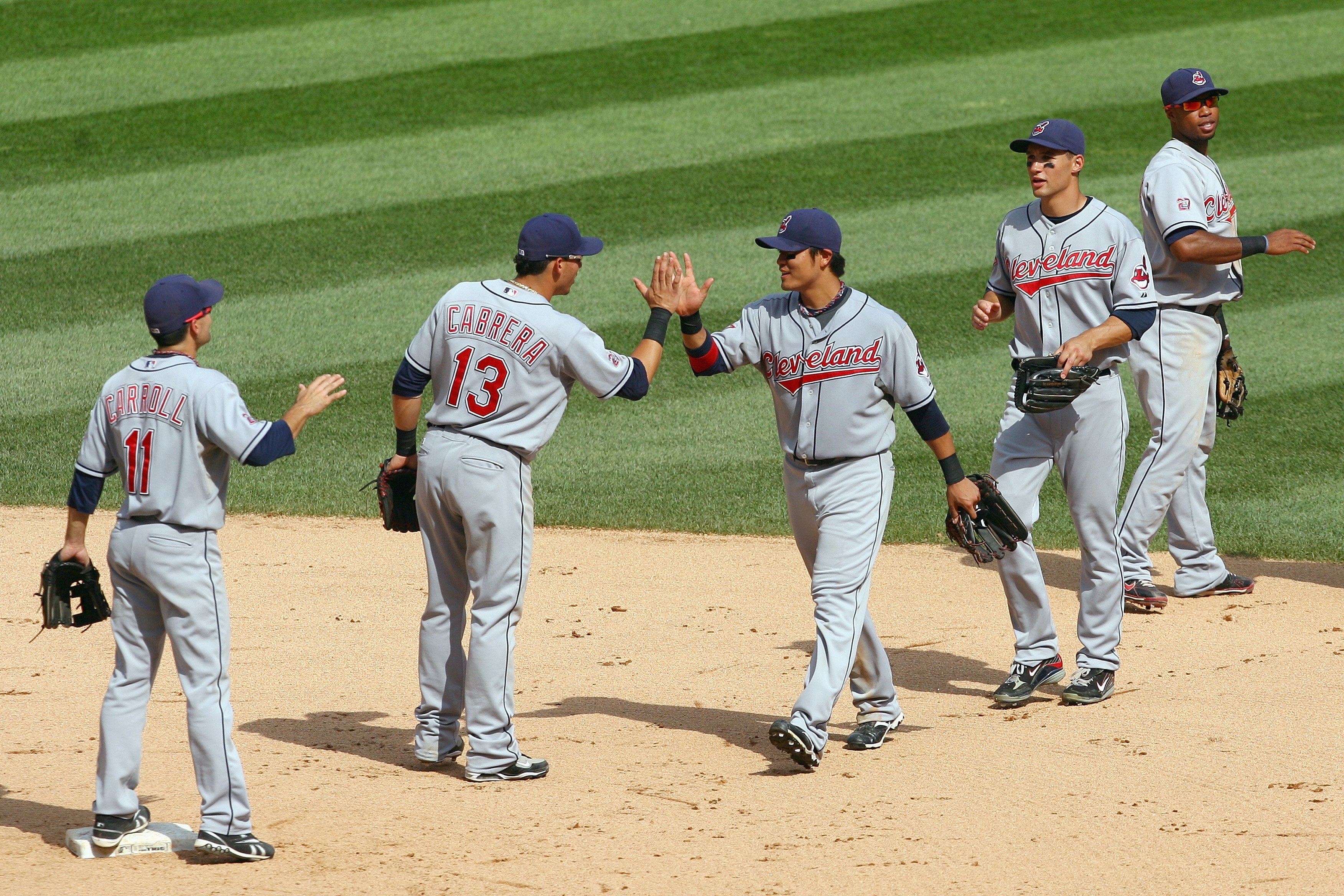 CHICAGO - AUGUST 09:  Outfielder Shin-Soo Choo #17 of the Cleveland Indians celebrates with Asdrubal Cabrera #13 after winning the game against the Chicago White Sox on August 9, 2009 at U.S. Cellular Field in Chicago, Illinois. The Indians defeated the W
